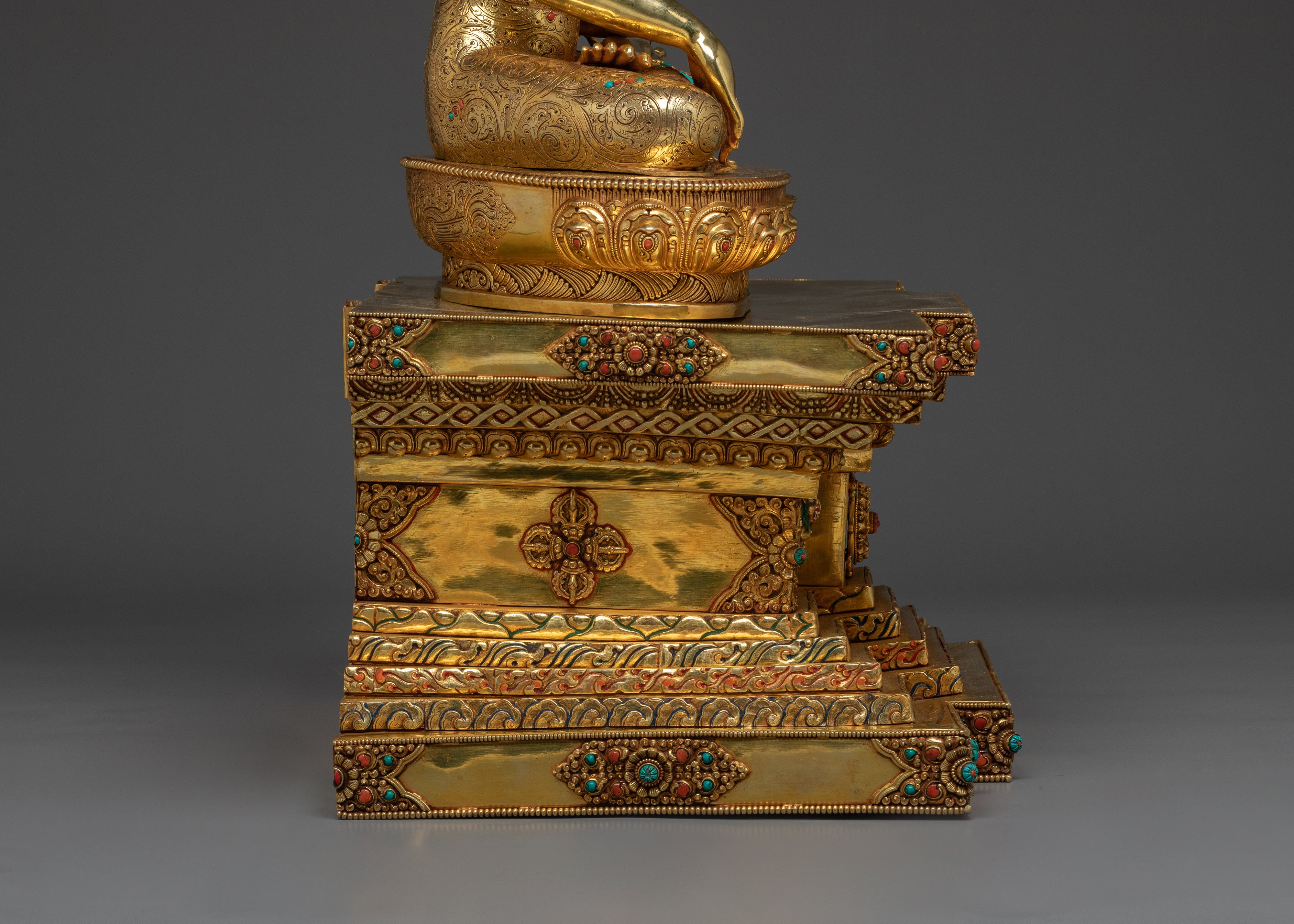 Figurine of Shakyamuni Buddha on throne | Embodying the Noble Path to Enlightenment