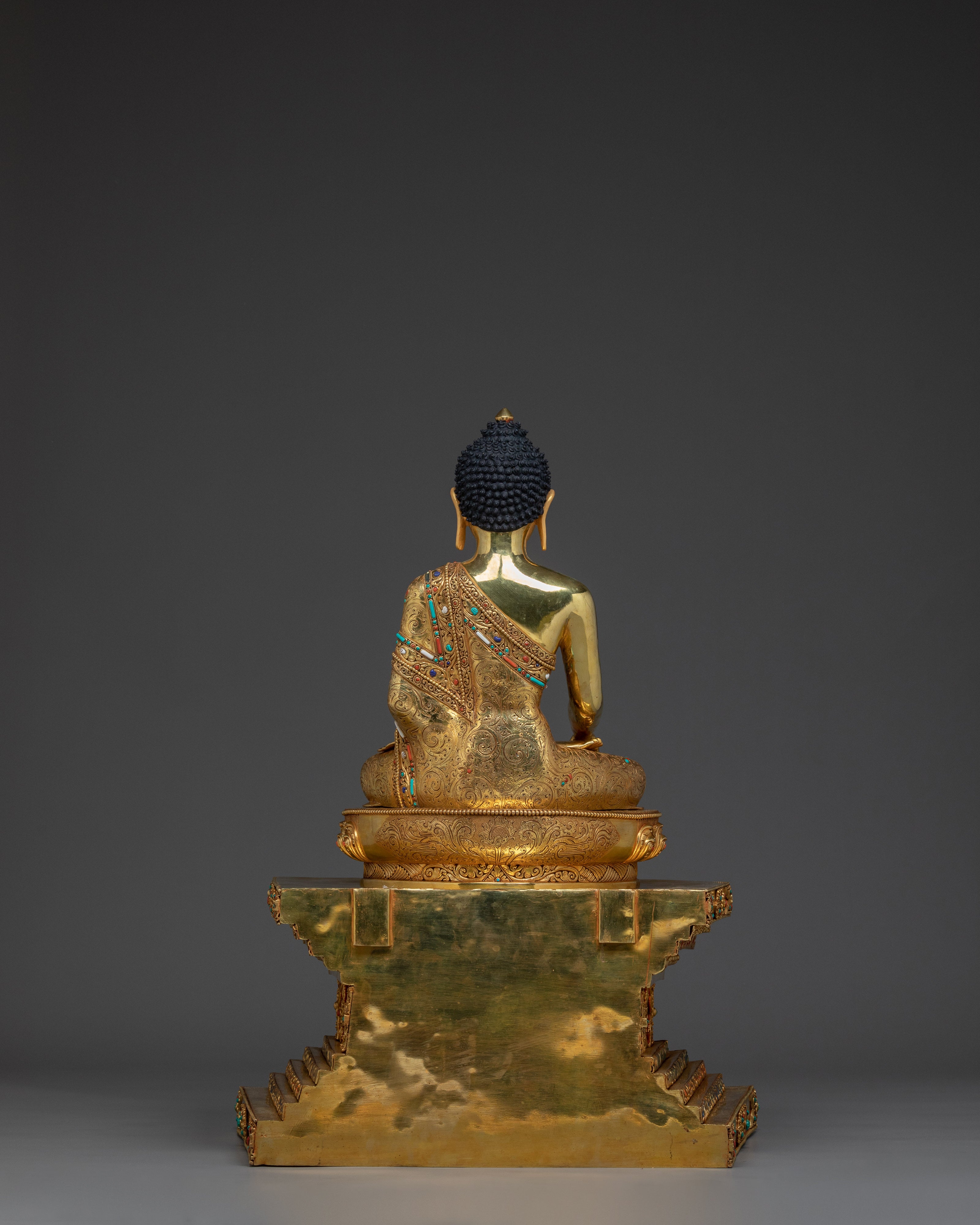 Figurine of Shakyamuni Buddha on throne | Embodying the Noble Path to Enlightenment