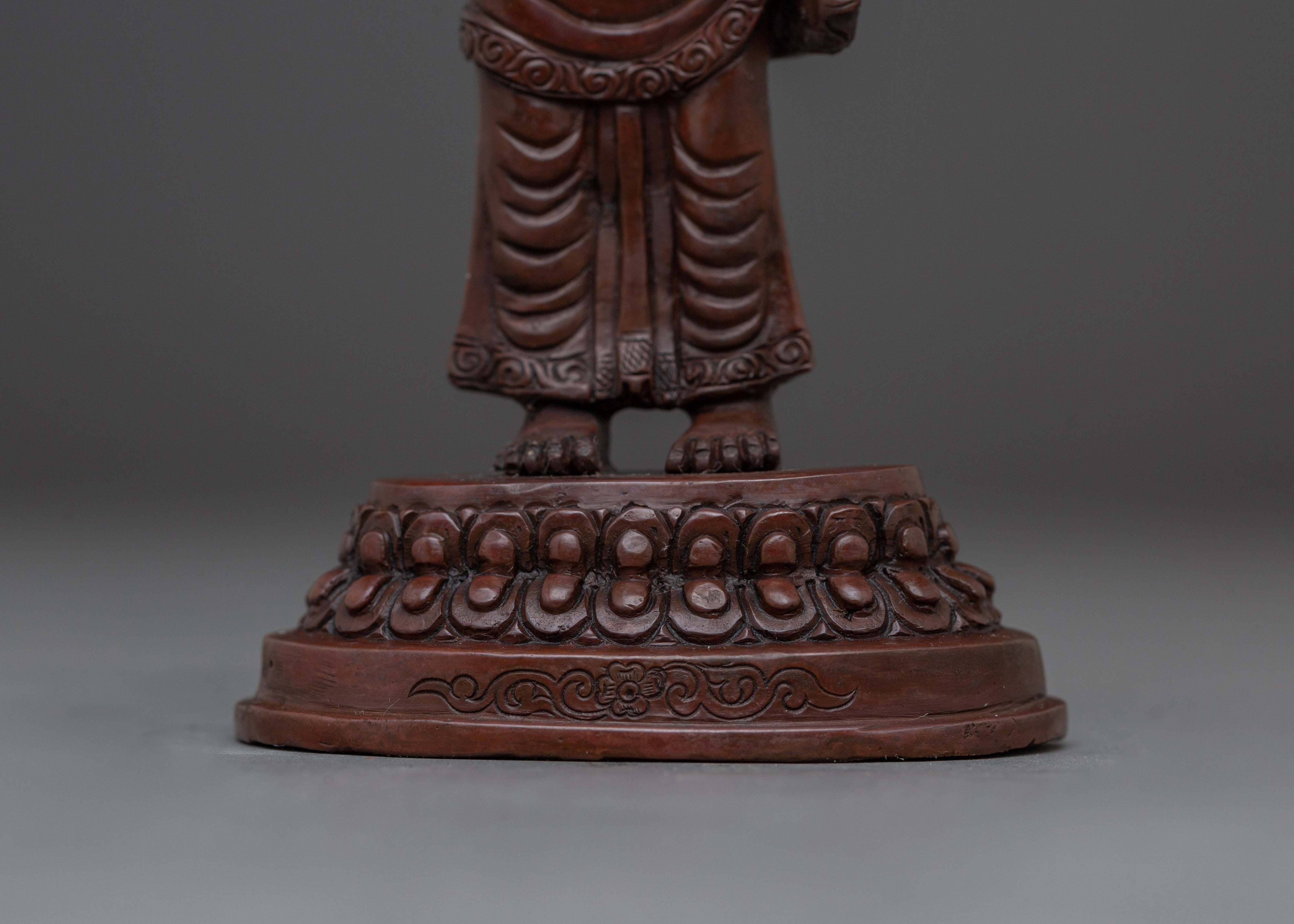 Standing Buddha Holding a Calf Statue | Unique Buddhist Statue