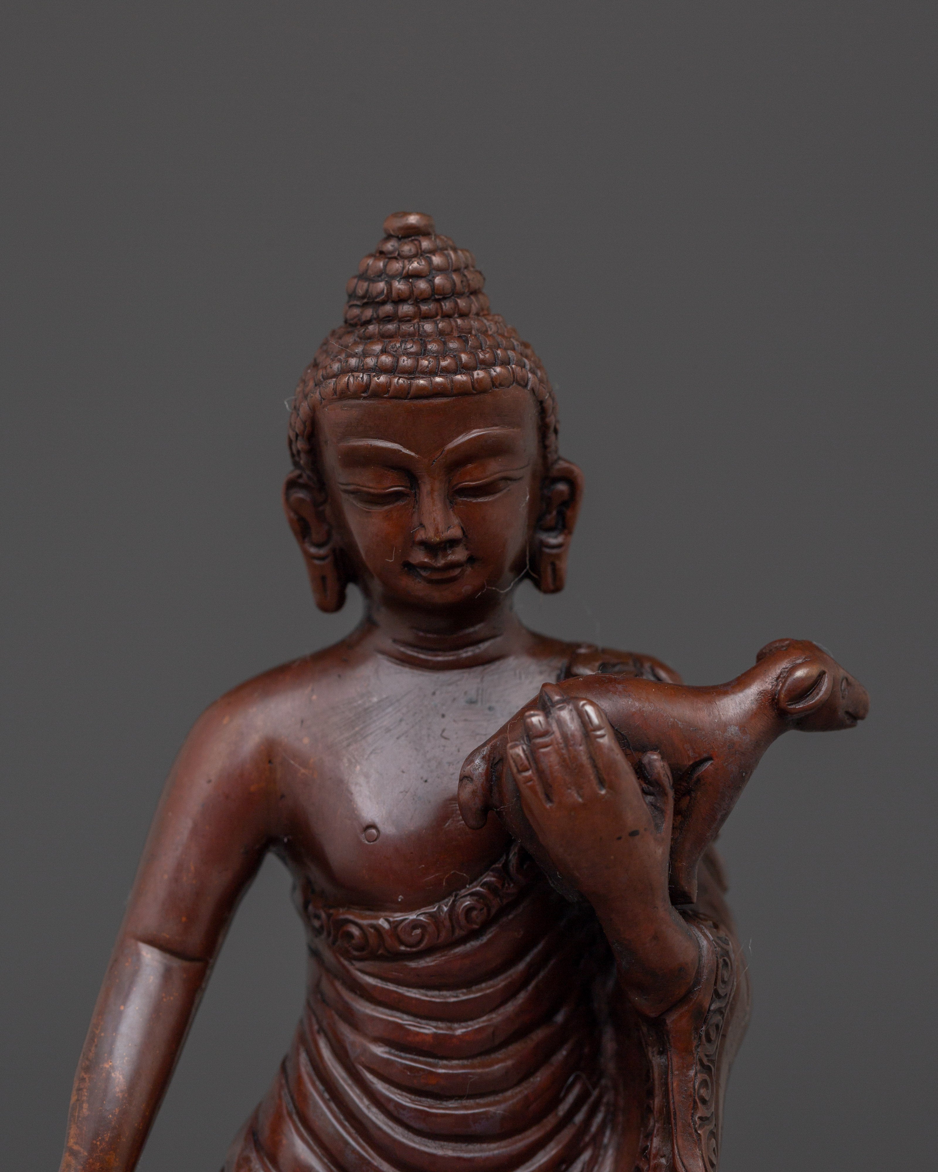 Standing Buddha Holding a Calf Statue | Unique Buddhist Statue