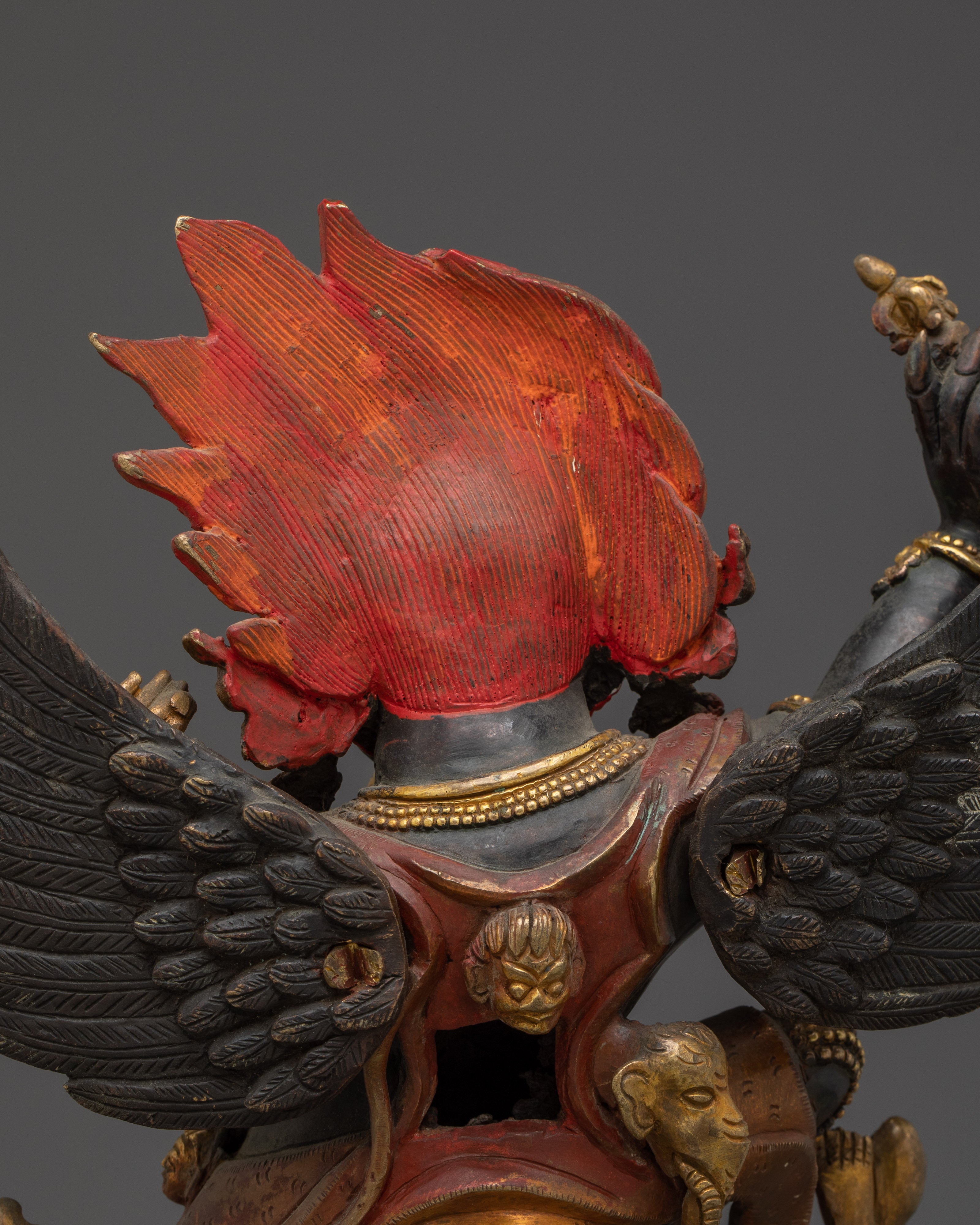 Mythical bird deity Garuda | Protector against Nagas