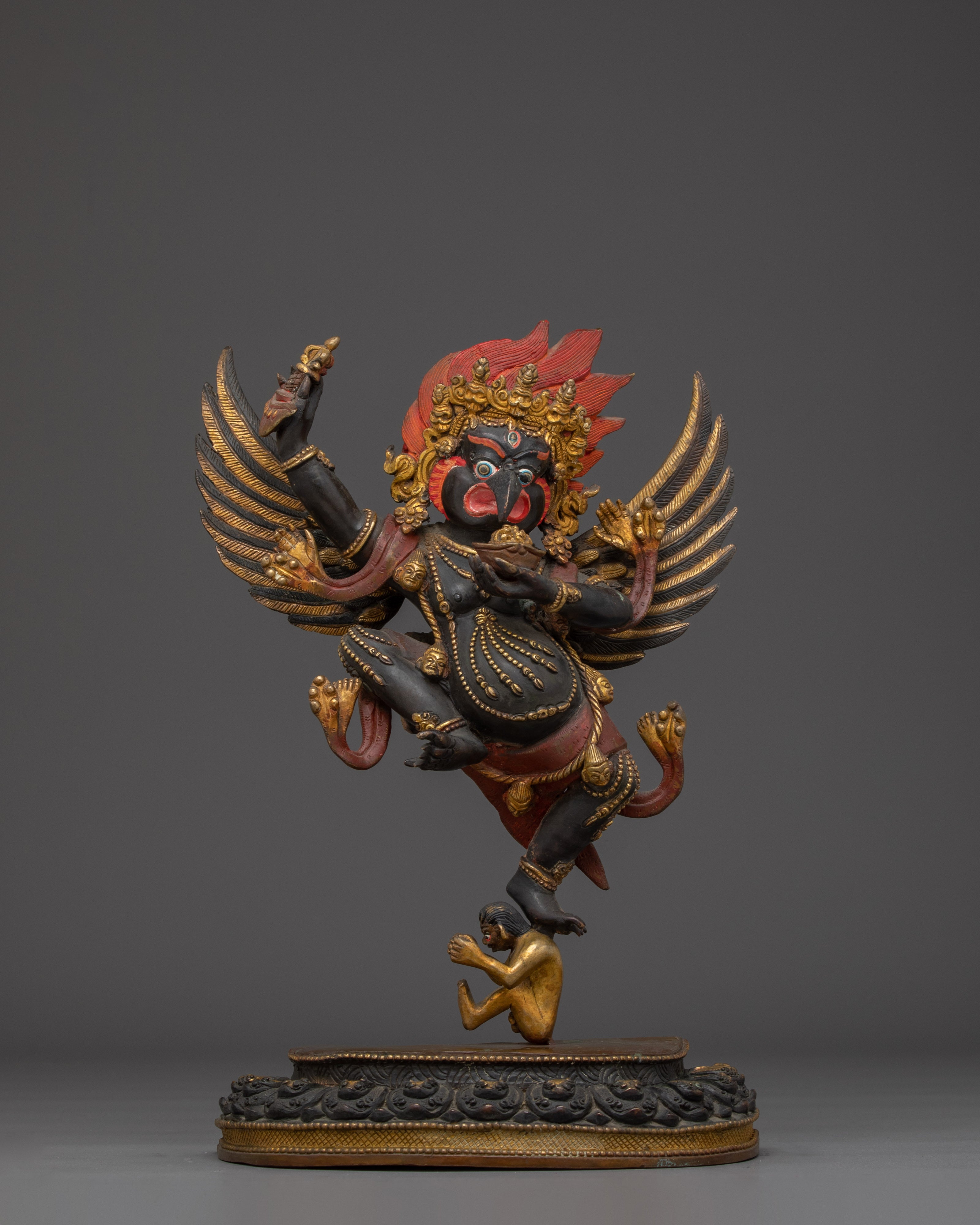 Mythical bird deity Garuda | Protector against Nagas