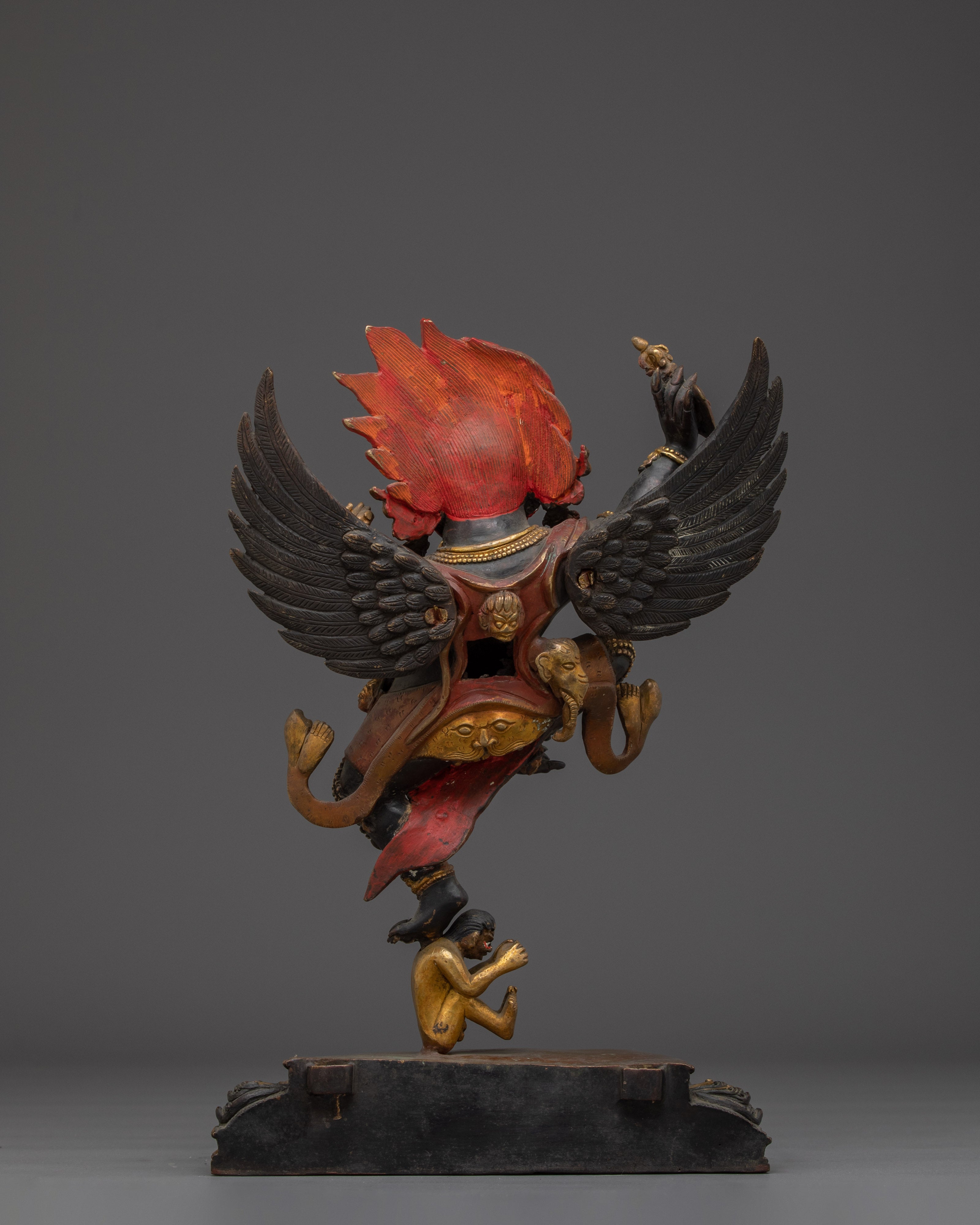 Mythical bird deity Garuda | Protector against Nagas