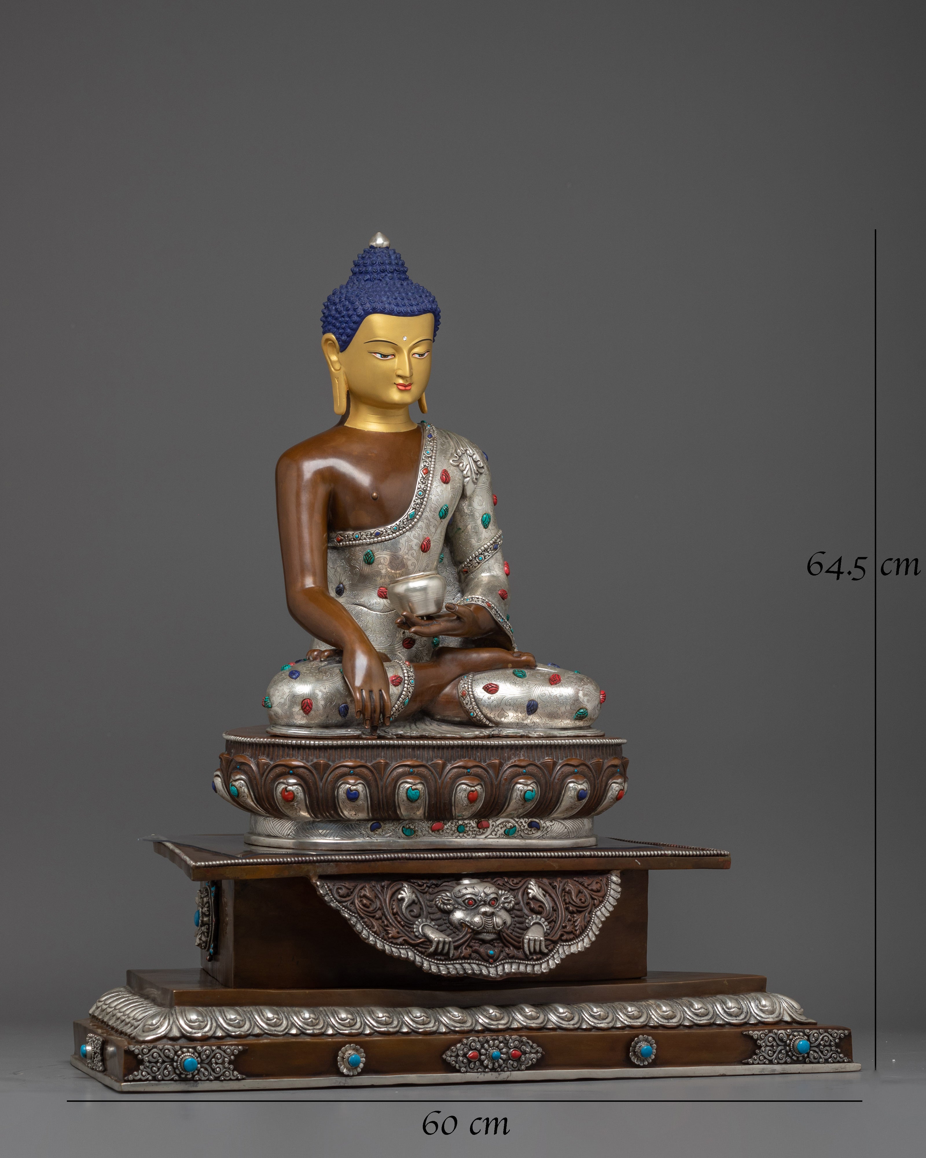 Shakyamuni Buddha statue seated on a throne