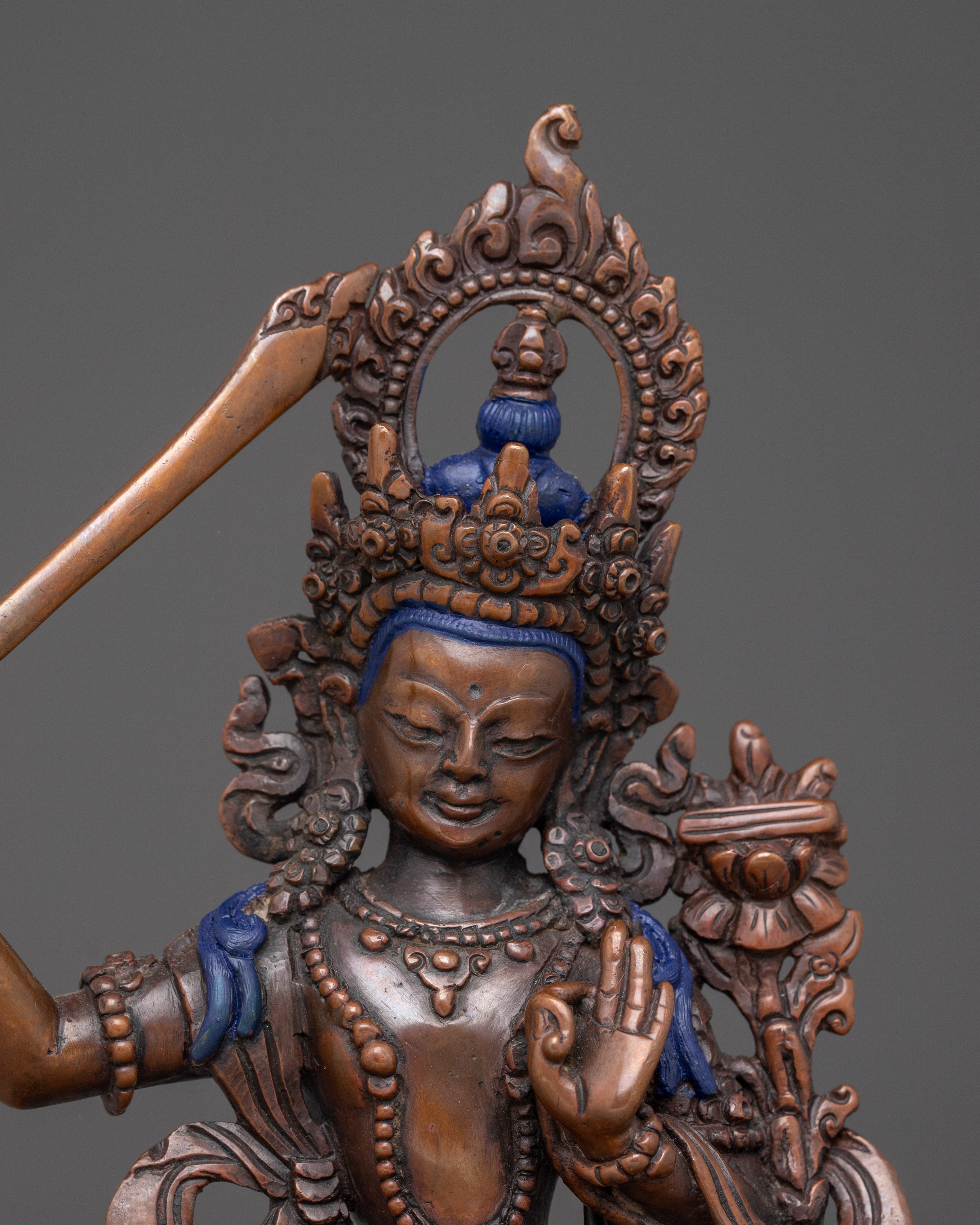 Statue of Manjushri: Symbol of Wisdom and Enlightenment
