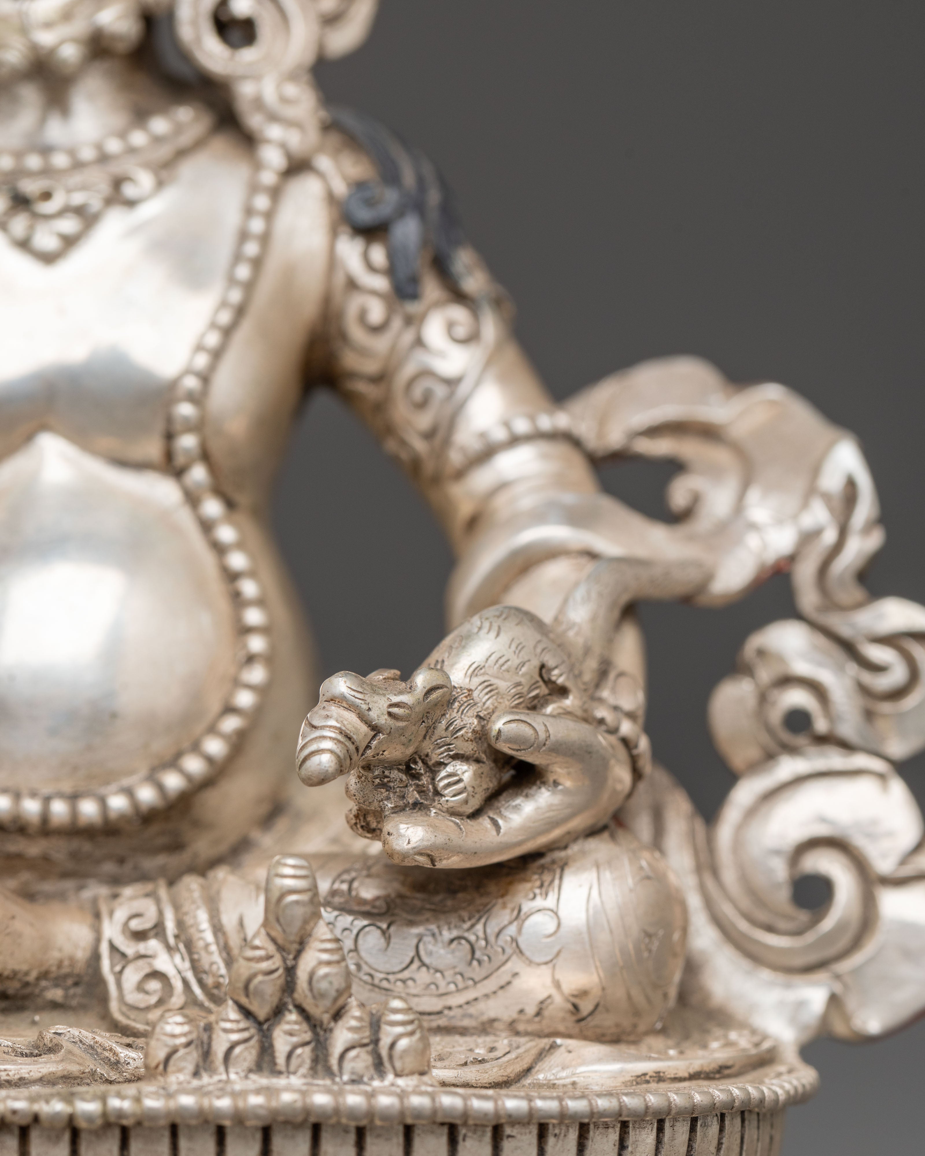 Silver Dzambhala Statue | Symbol of Abundance