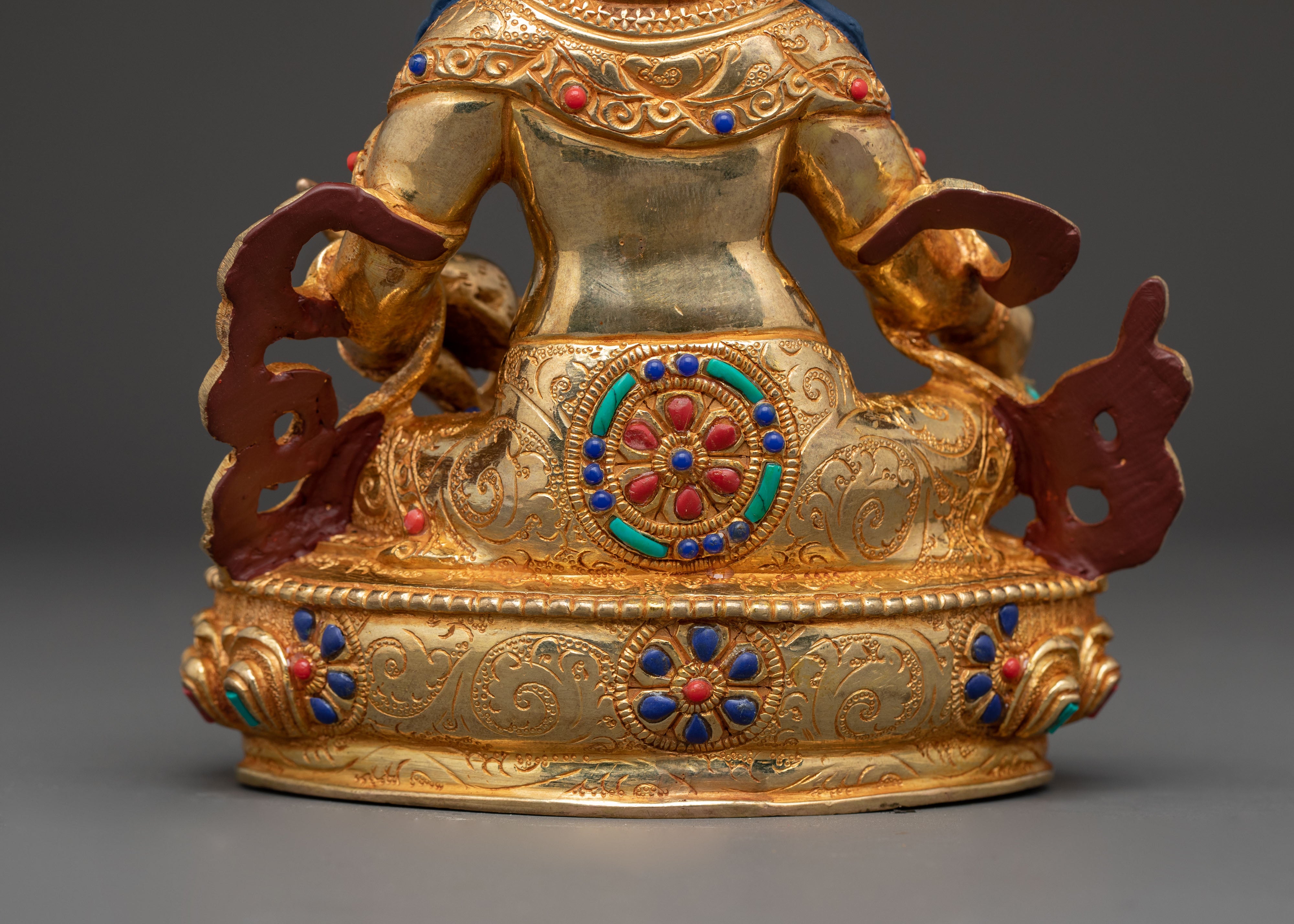 Statue of Dzambhala: Buddhist Wealth Icon