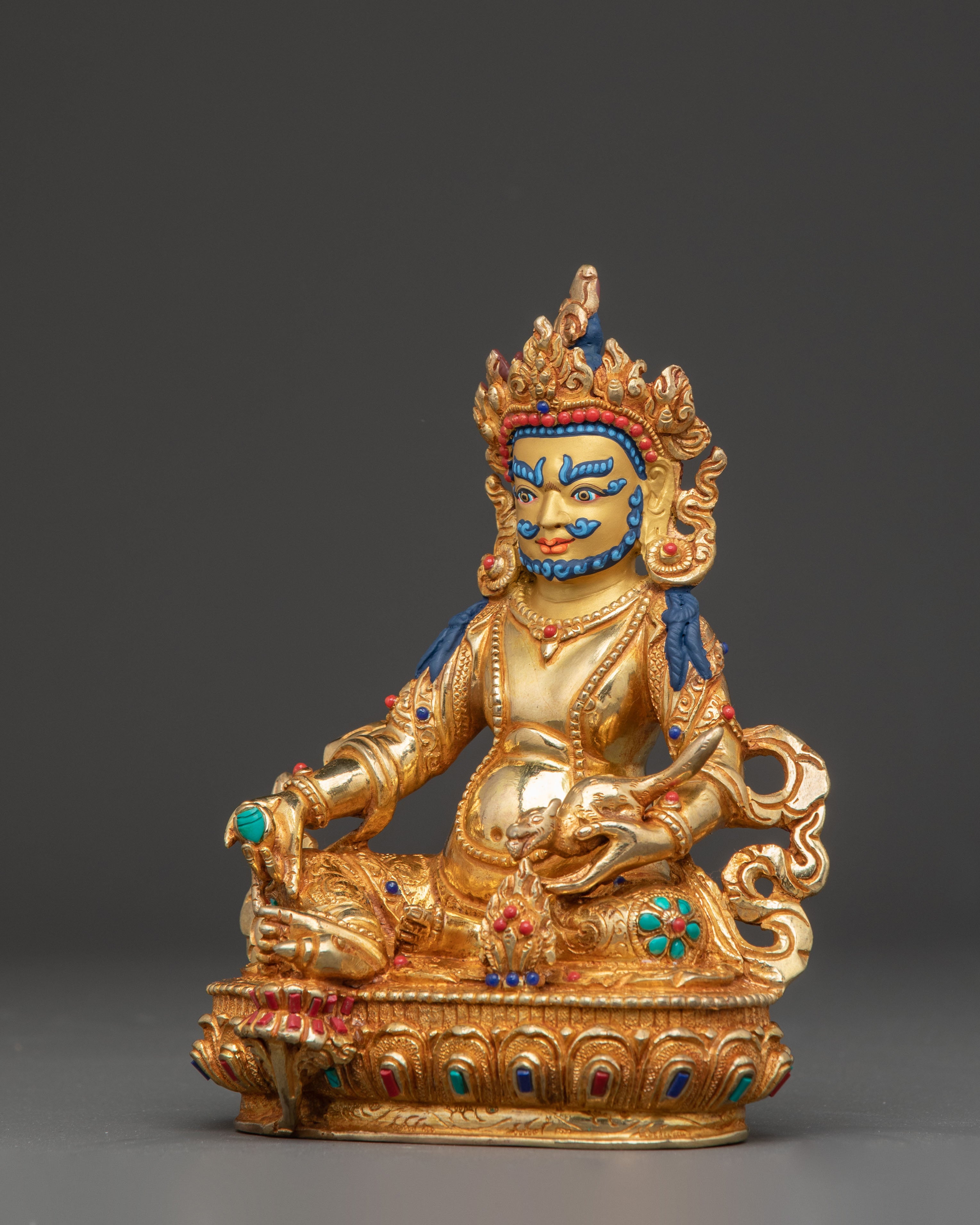 Statue of Dzambhala: Buddhist Wealth Icon