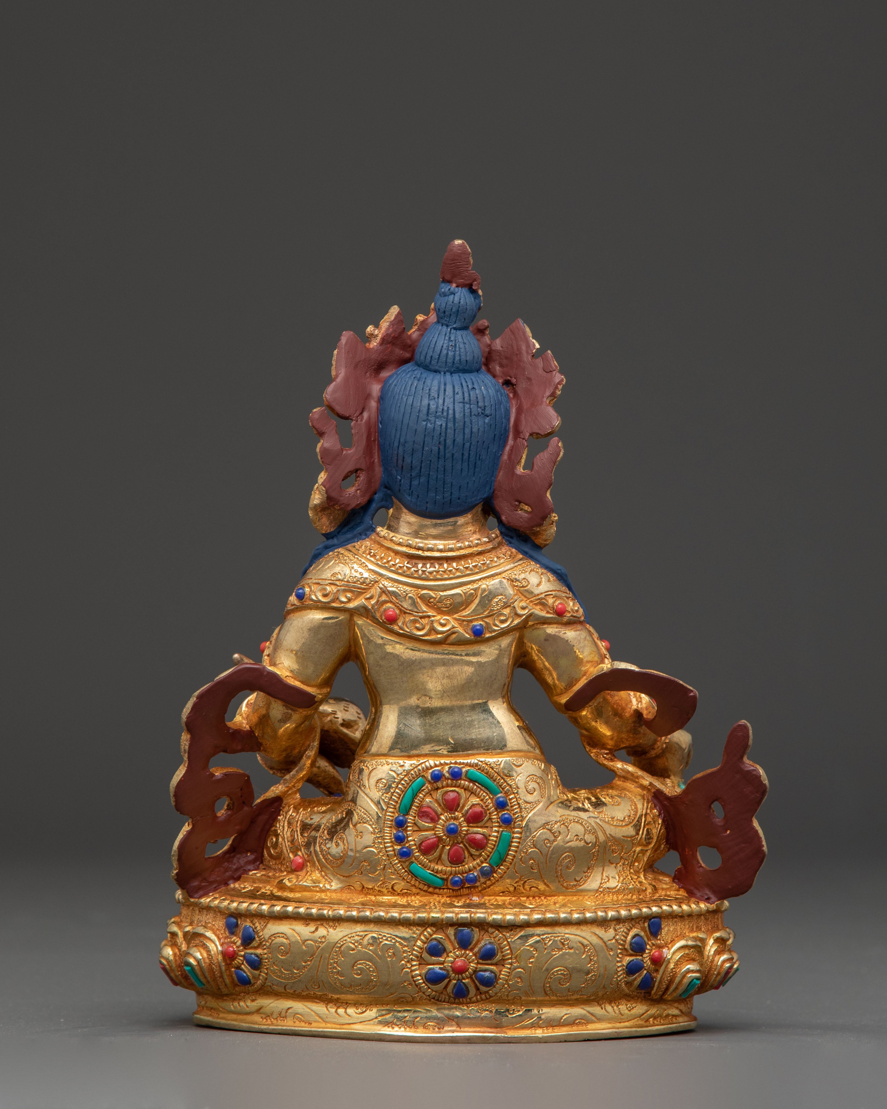 Statue of Dzambhala: Buddhist Wealth Icon