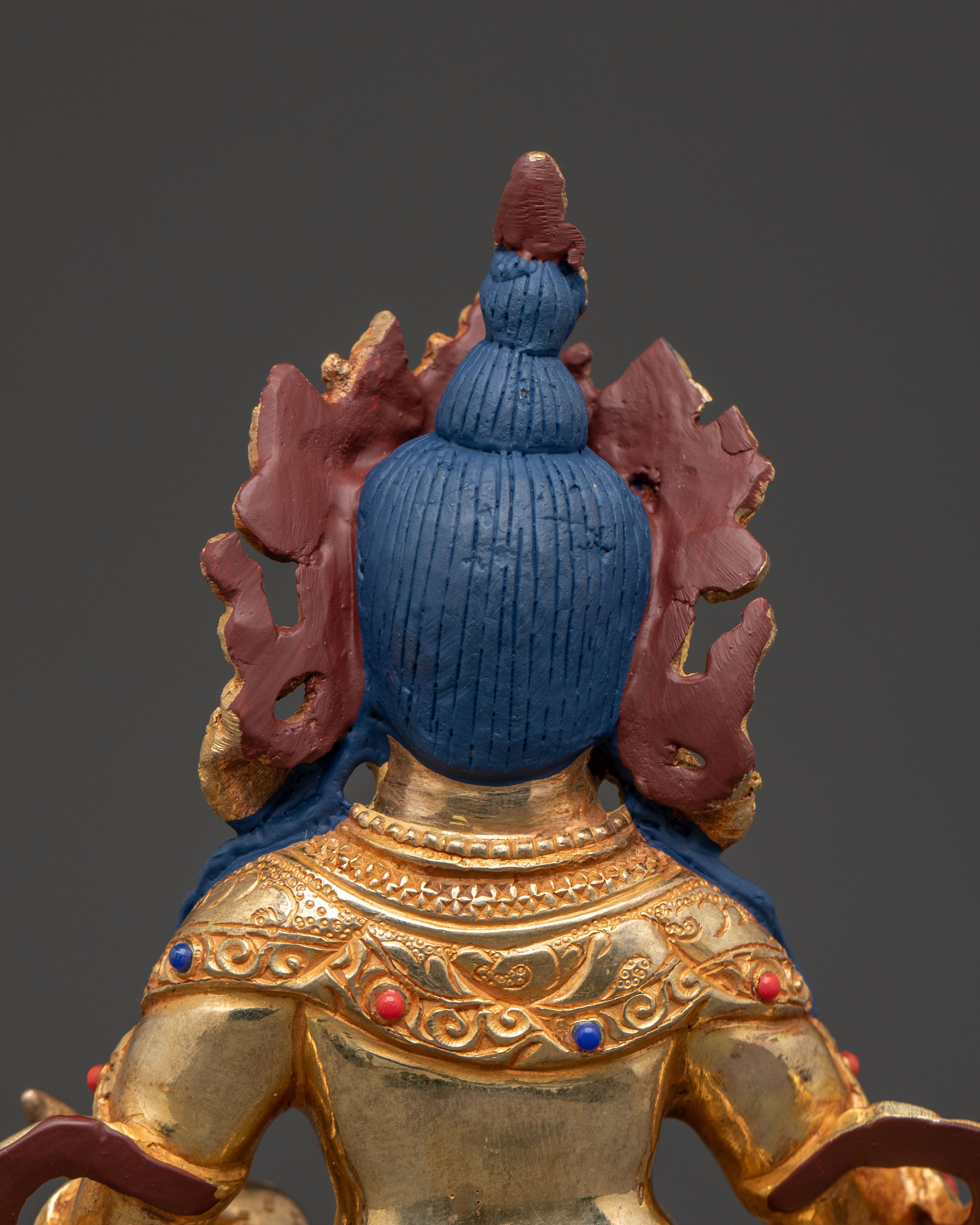 Statue of Dzambhala: Buddhist Wealth Icon