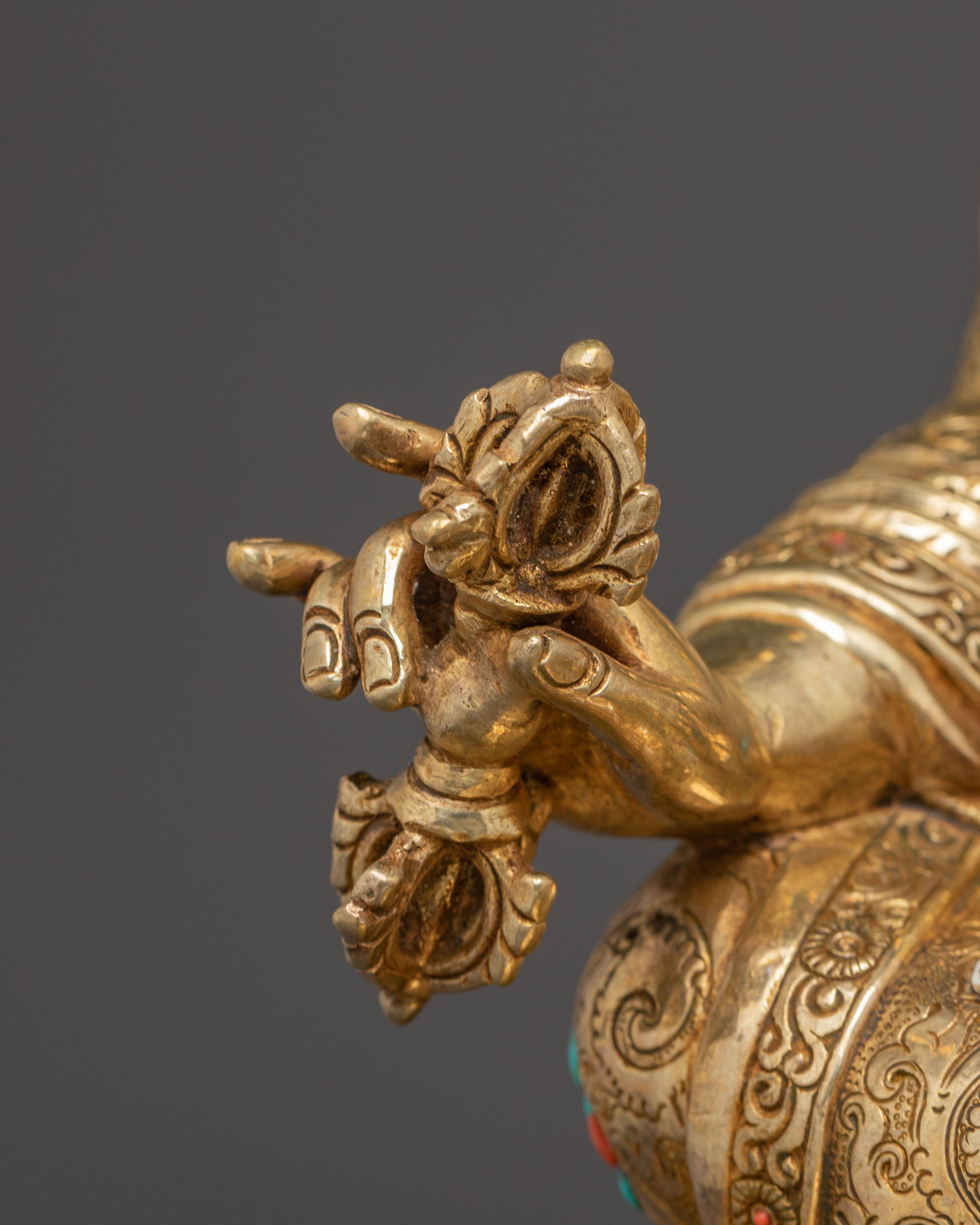 Statue of Guru Rinpoche with Yeshe Tshogyal and Mandharva