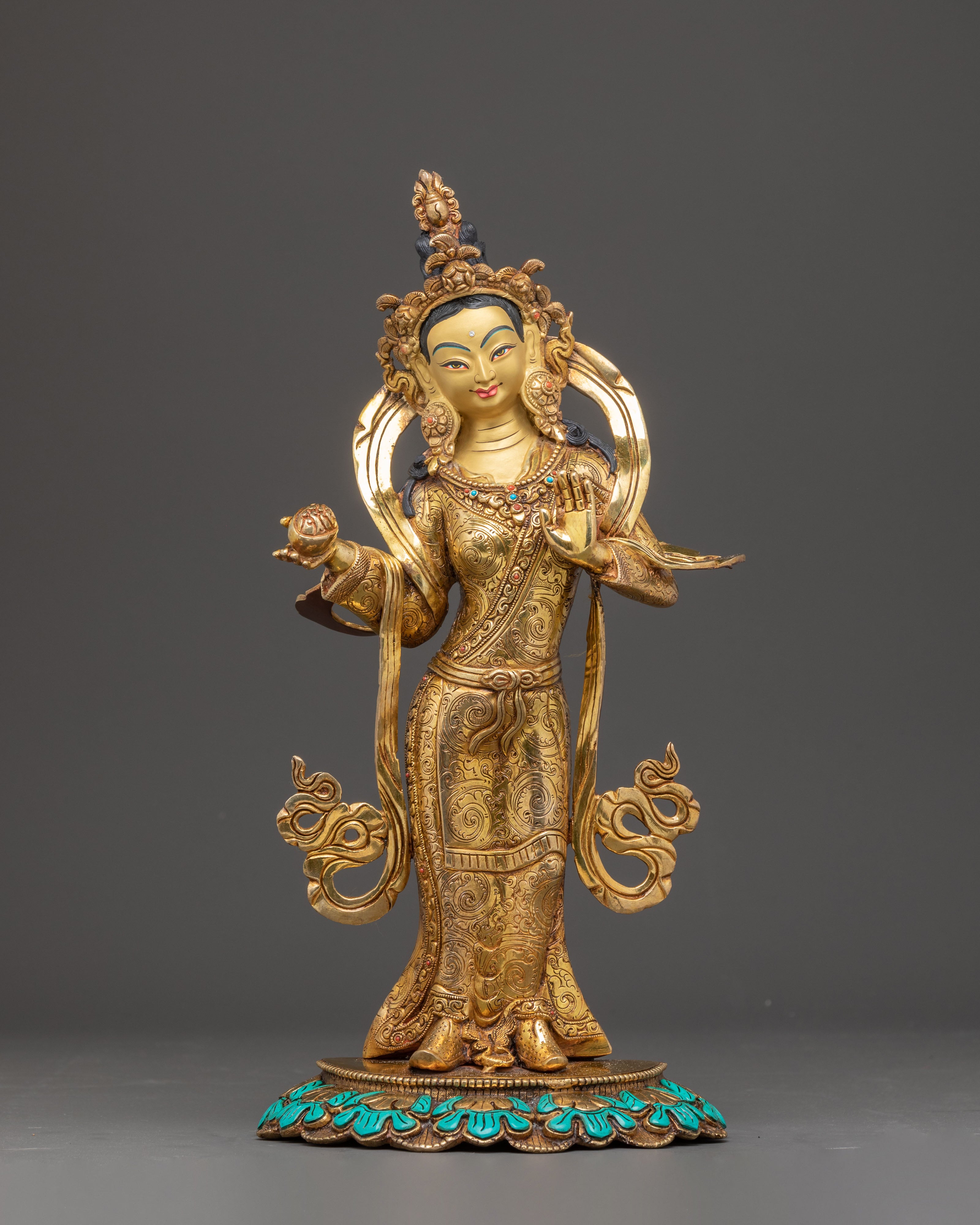 Statue of Guru Rinpoche with Yeshe Tshogyal and Mandharva