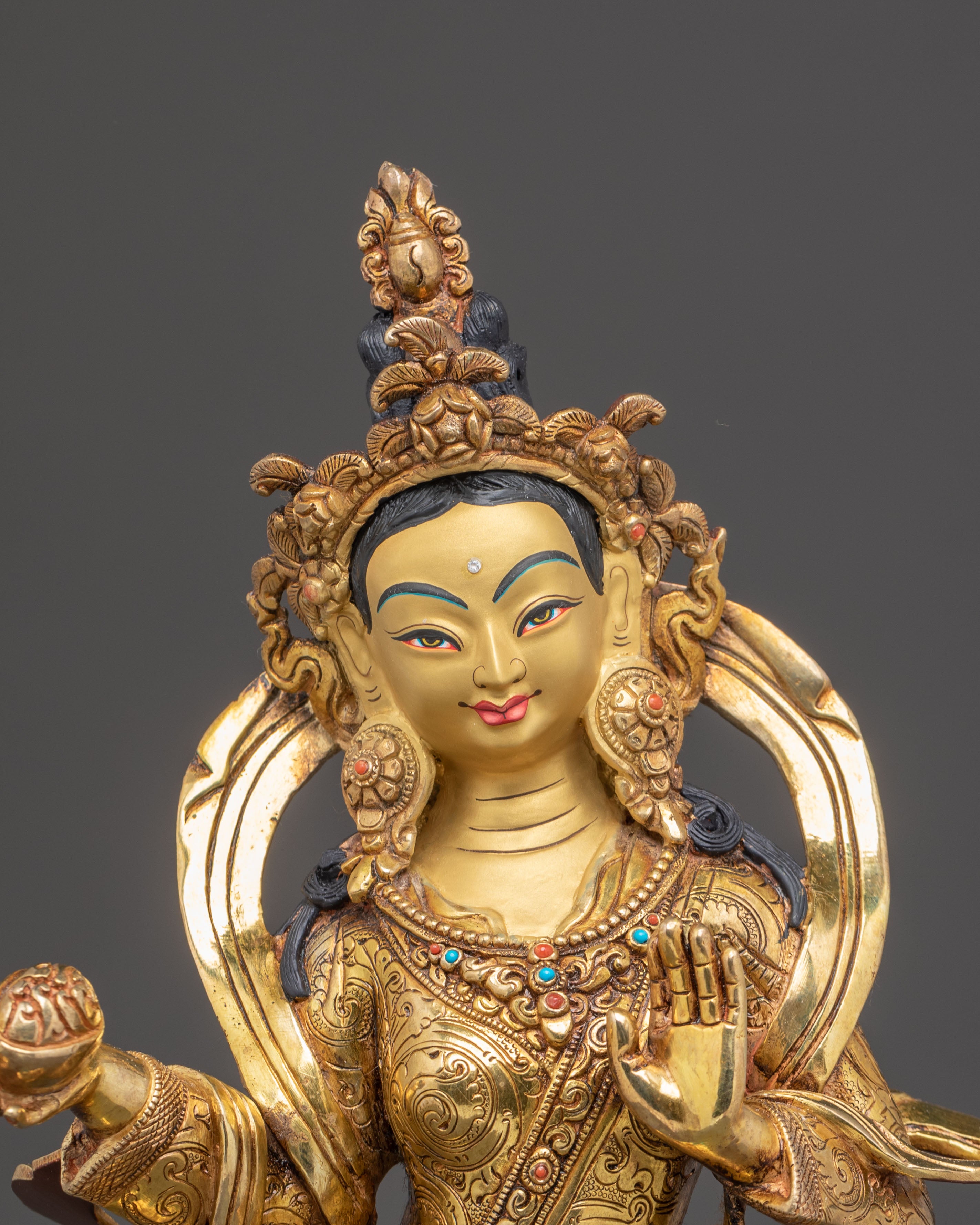 Statue of Guru Rinpoche with Yeshe Tshogyal and Mandharva