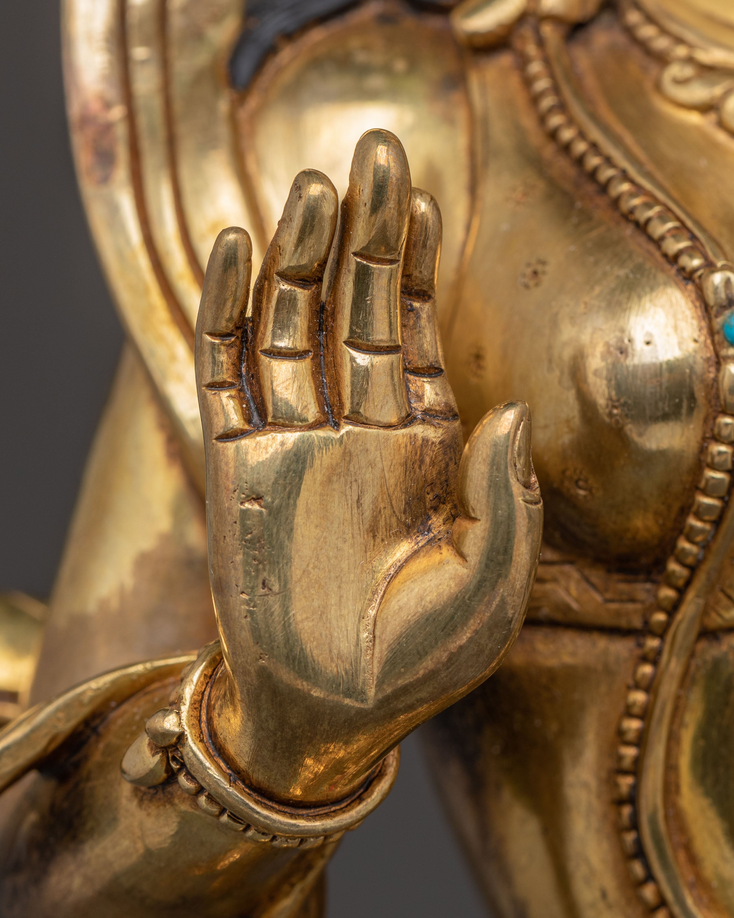 Statue of Guru Rinpoche with Yeshe Tshogyal and Mandharva