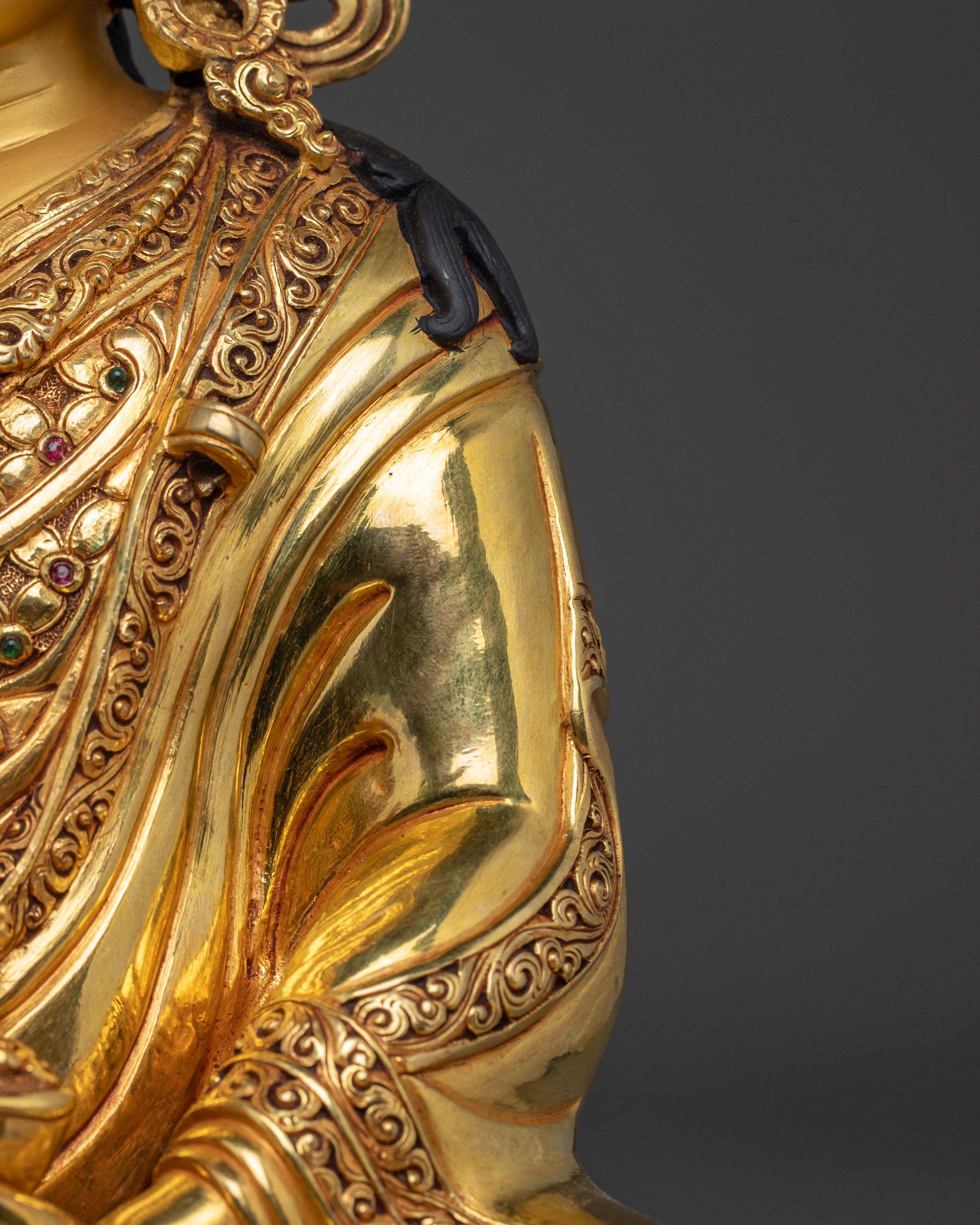 Guru Rinpoche Statue in 24K Gold: Symbol of Wisdom