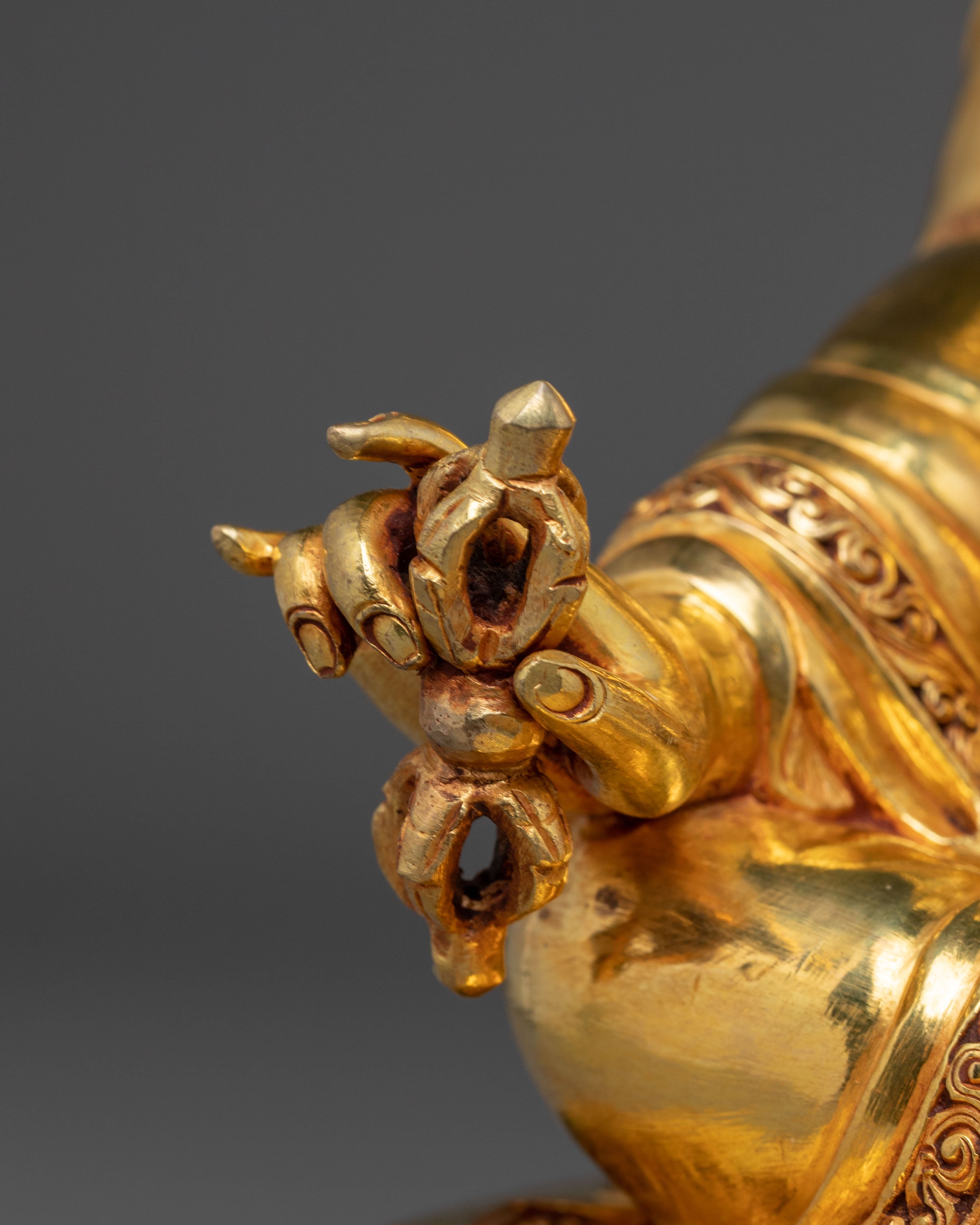 Guru Rinpoche Statue in 24K Gold: Symbol of Wisdom