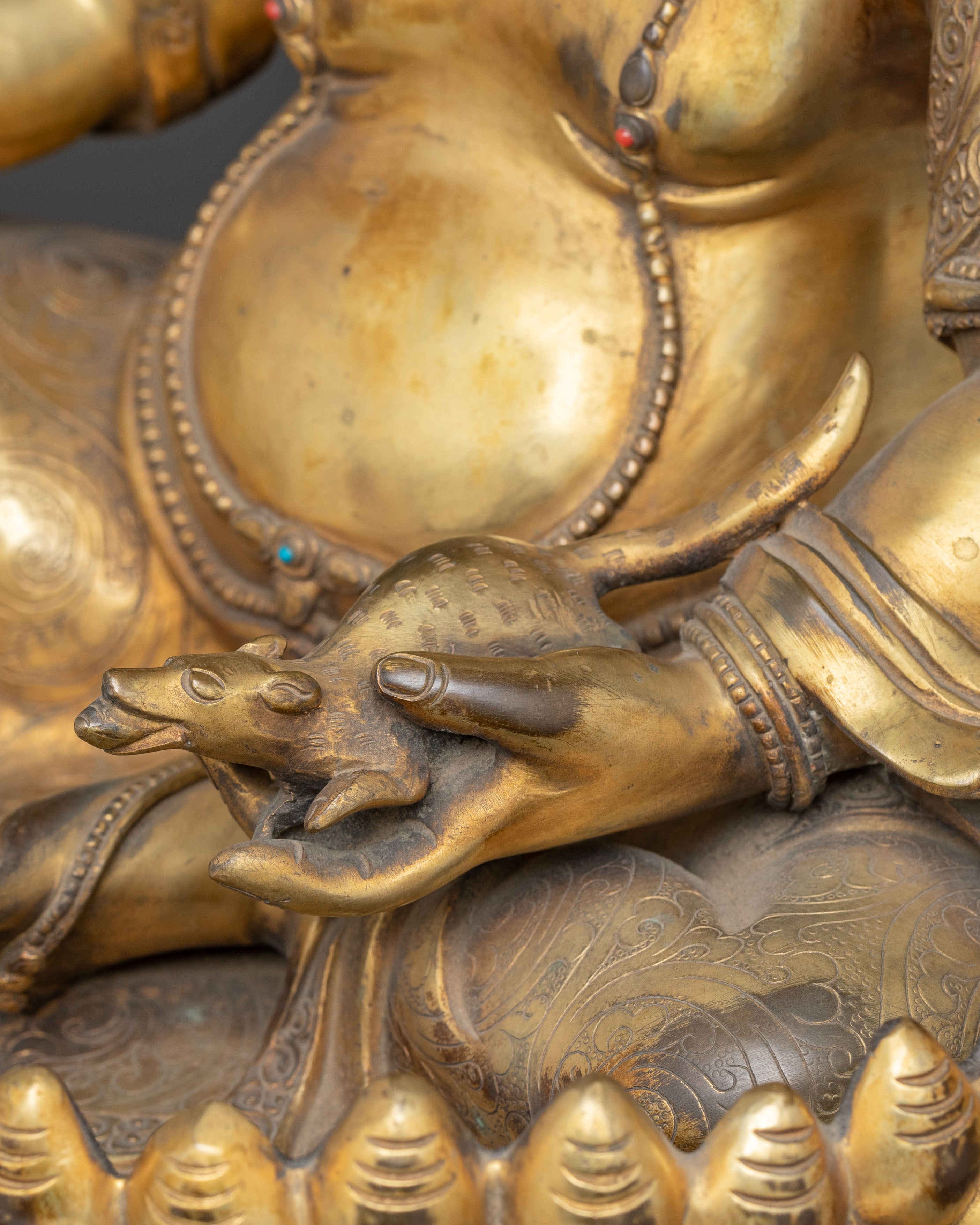 Sculpture of Wealth Icon Dzambhala: Symbol of Abundance