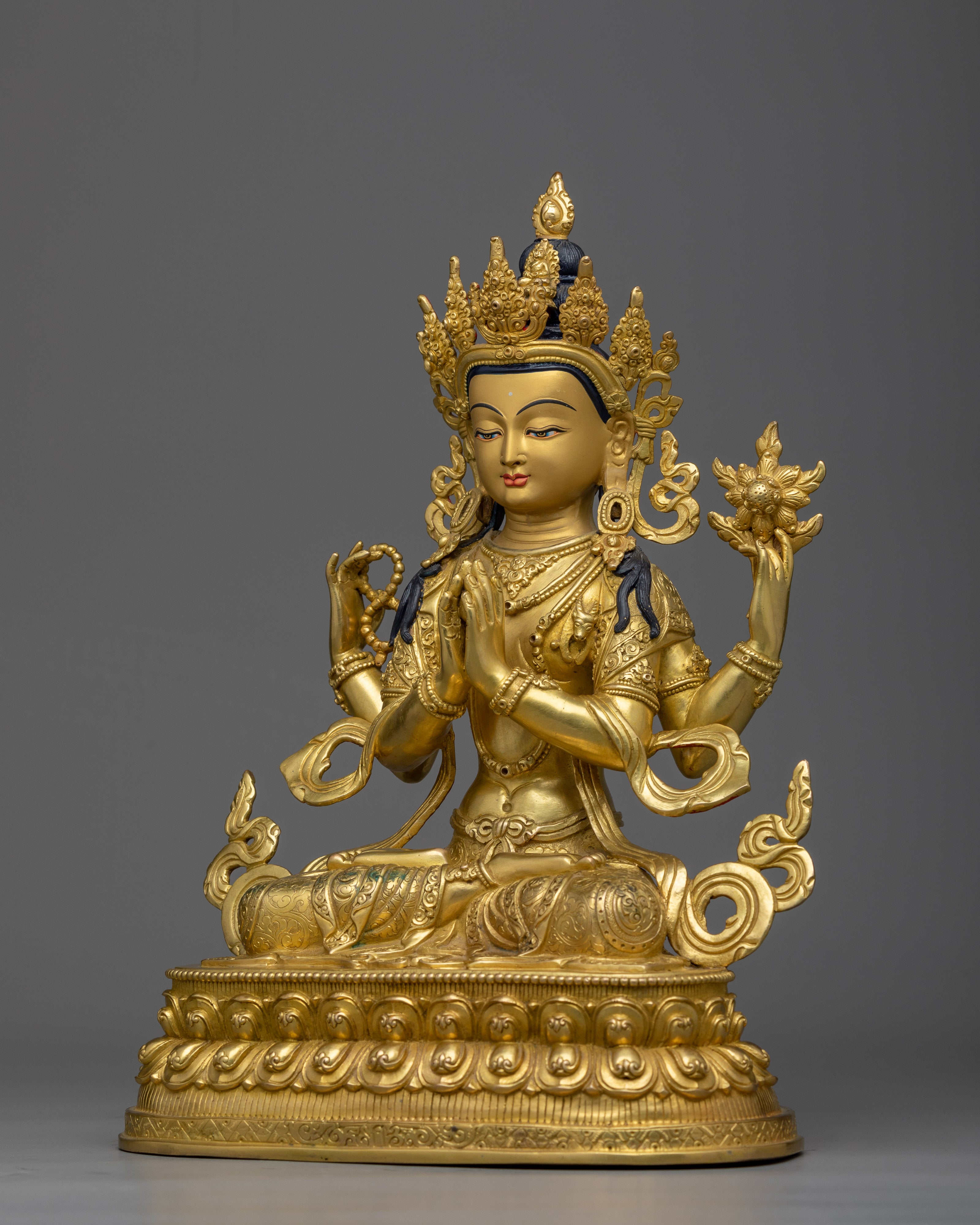 buddhist deity with many arms
