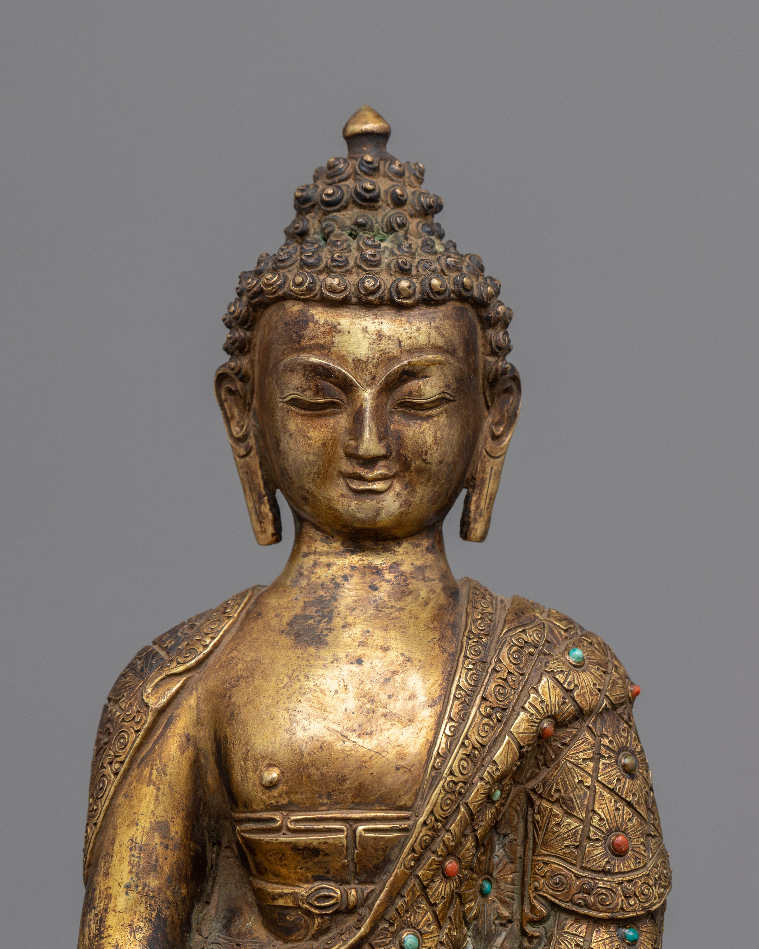 antique garden statue of Amitabha Buddha