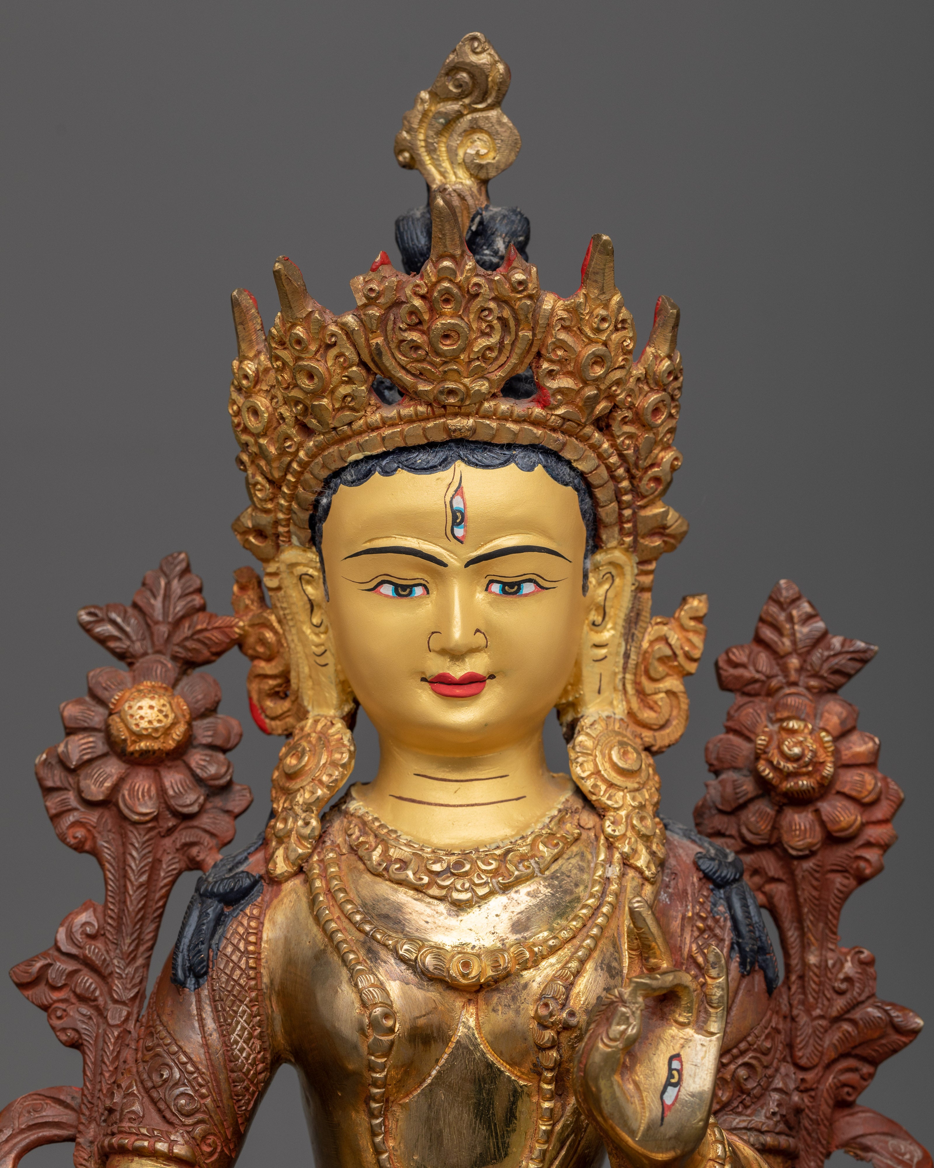 golden white tara statue