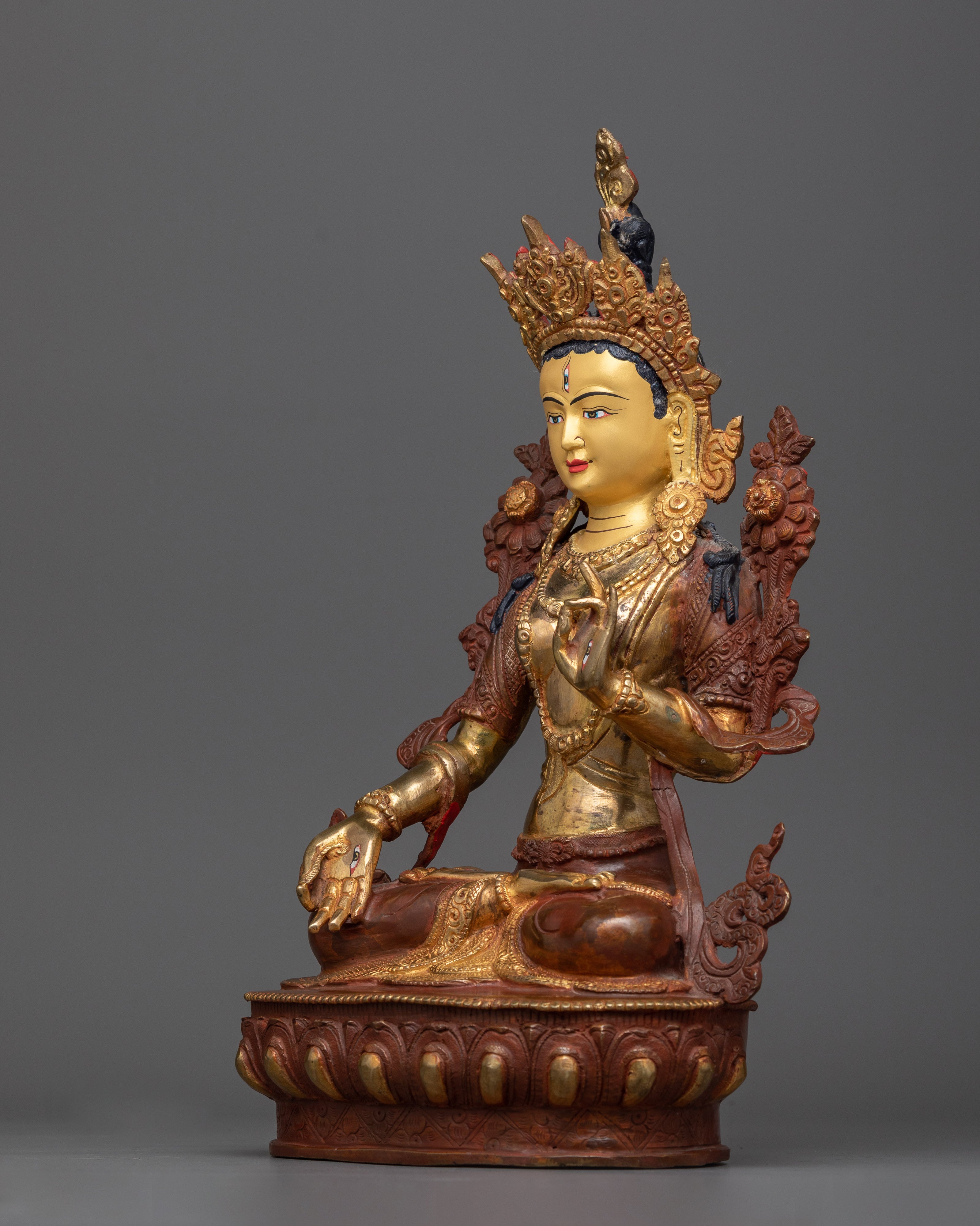 golden white tara statue