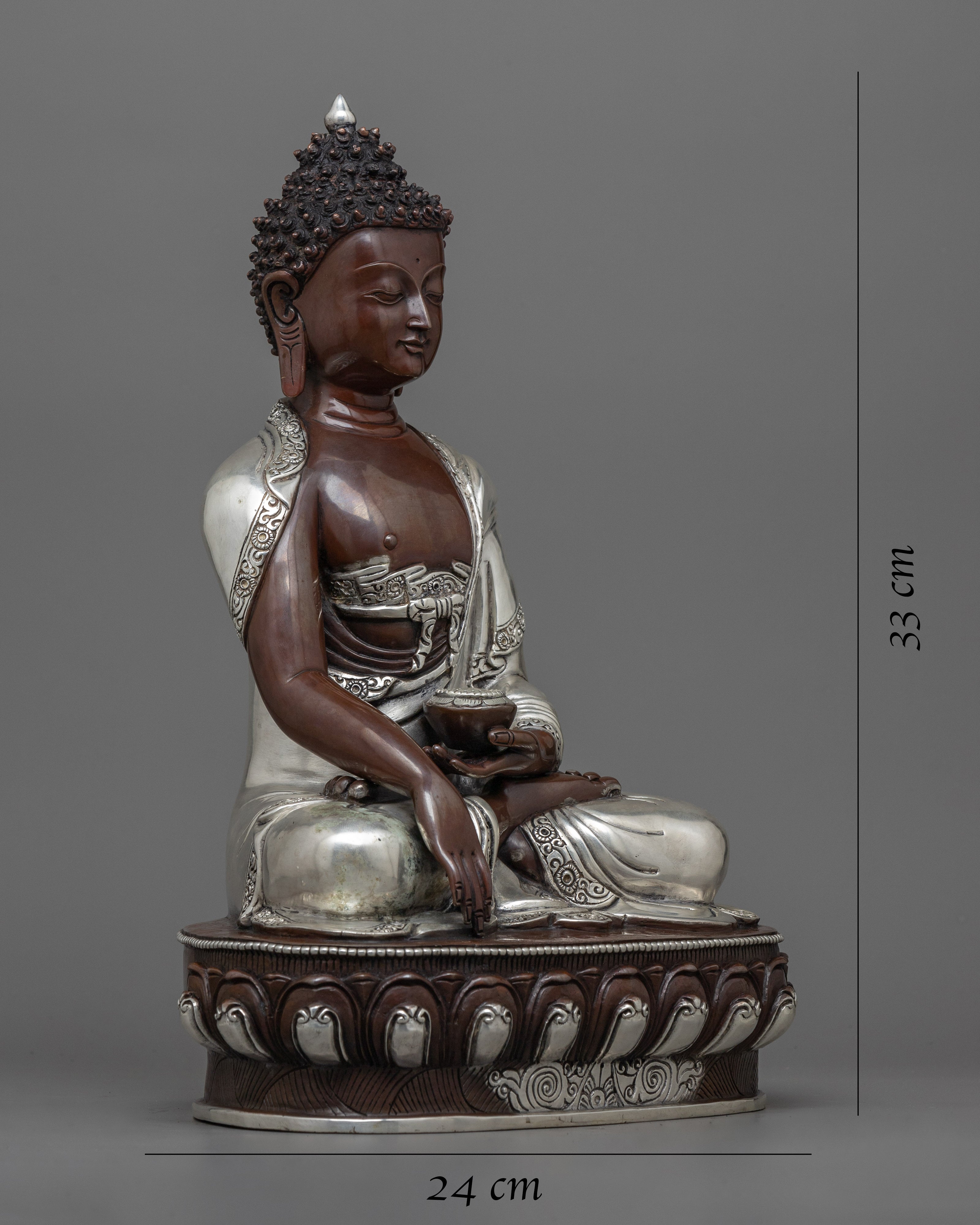silver plated buddha statue