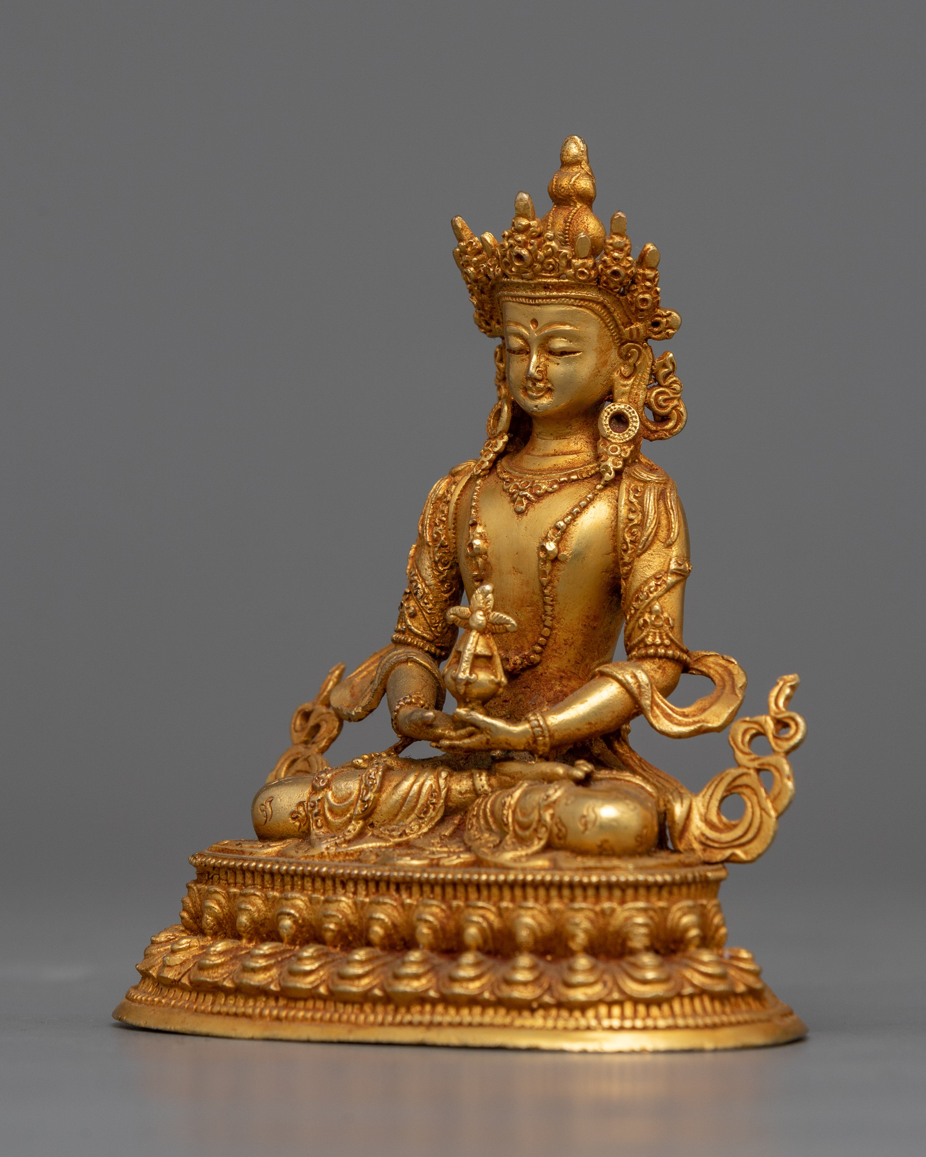 tiny statue of-amitayus