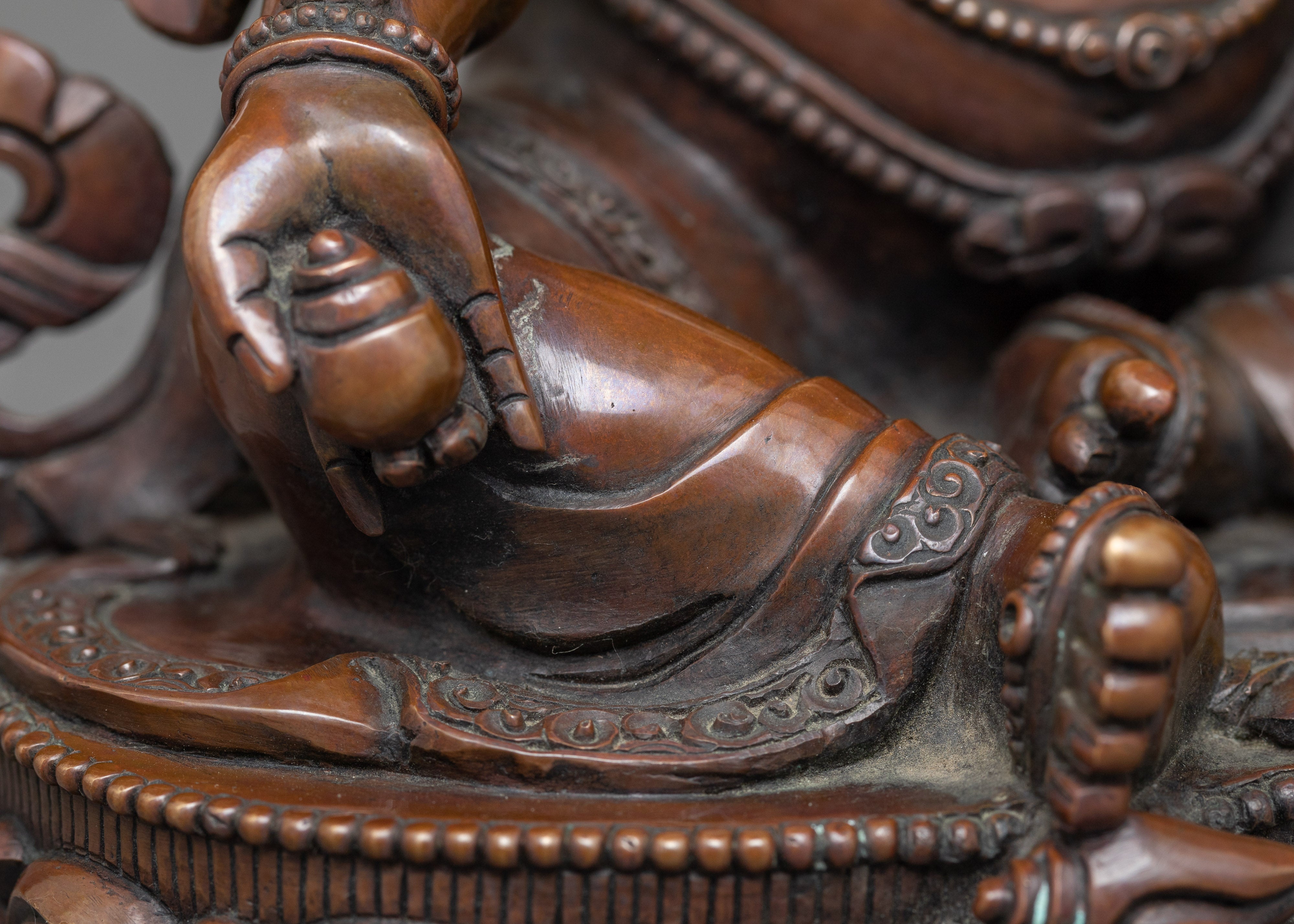 Yellow Zambhala Statue | An Oxidized Copper Emblem of Prosperity