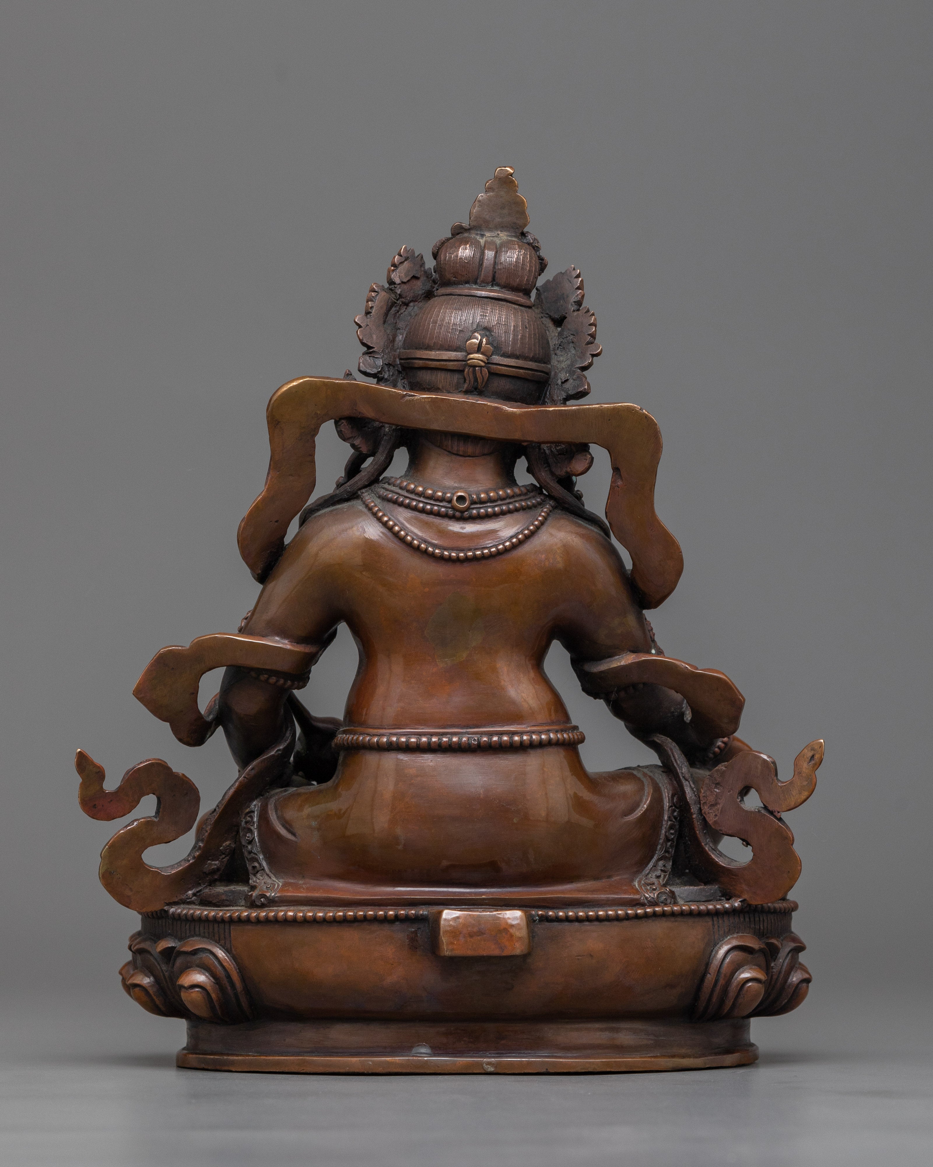 Yellow Zambhala Statue | An Oxidized Copper Emblem of Prosperity