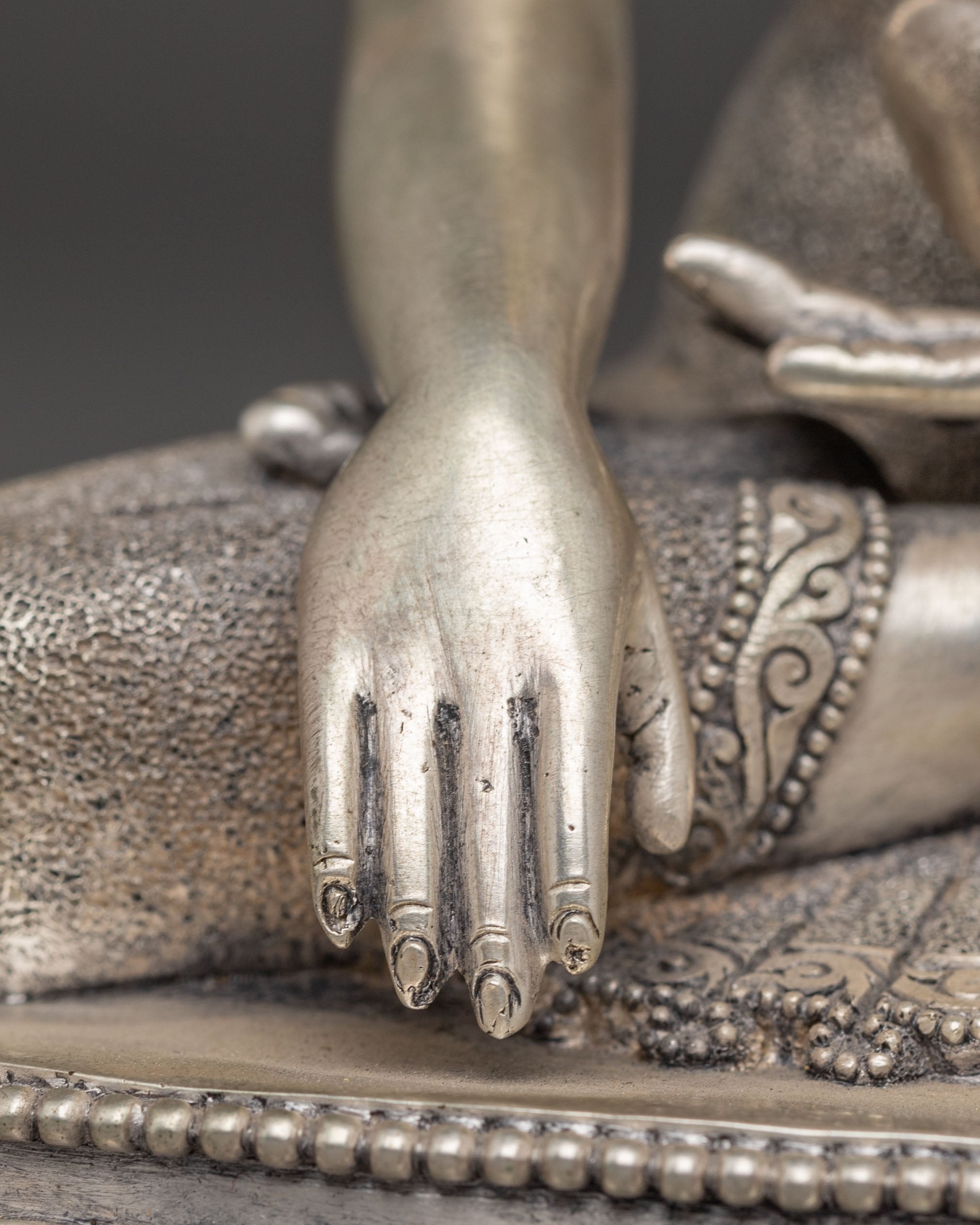 Statue of Silver-Plated Shakyamuni Buddha: The Awakened One