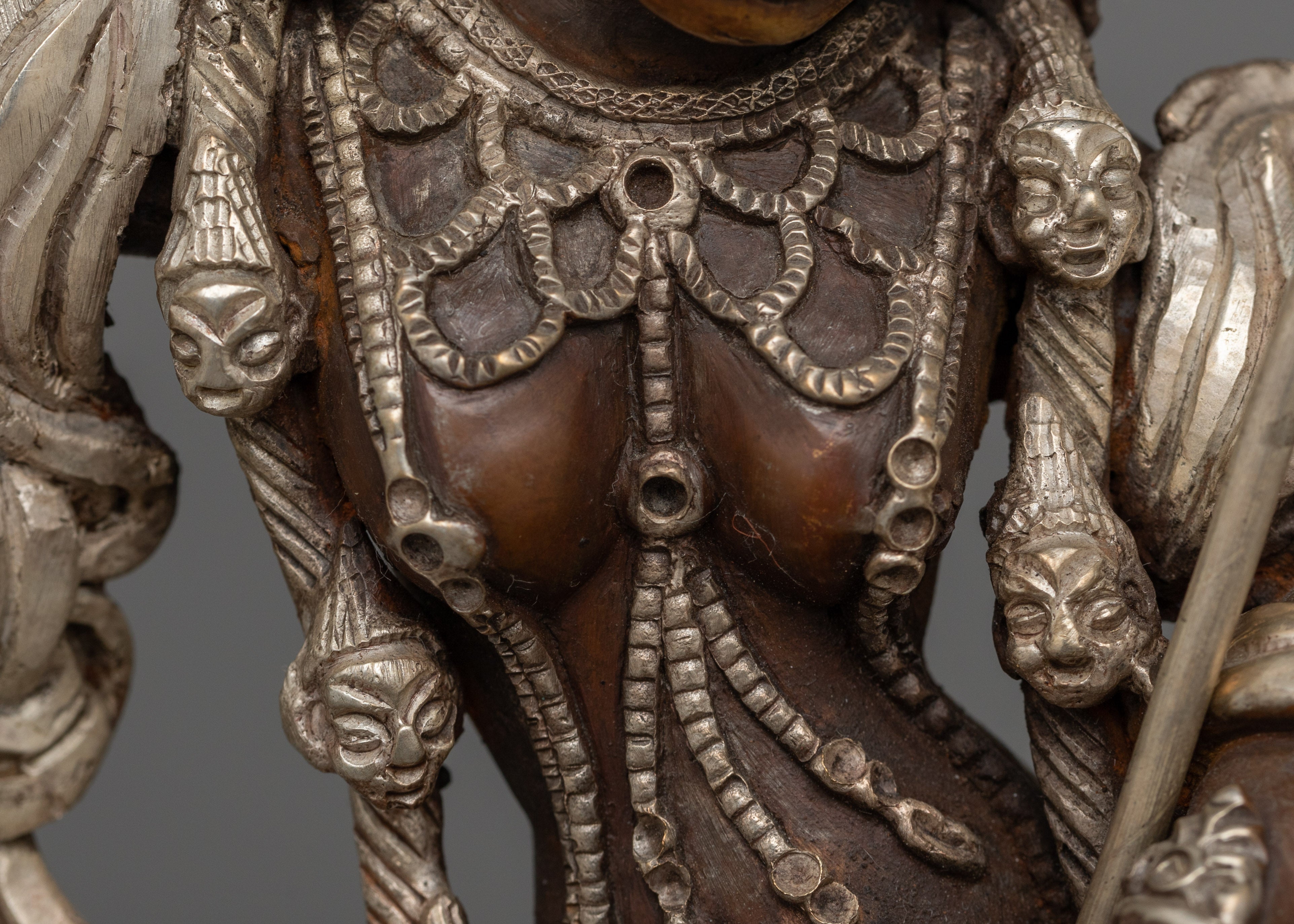 Singhamukha Buddha Statue | Silver-Plated Oxidized Copper Sculpture