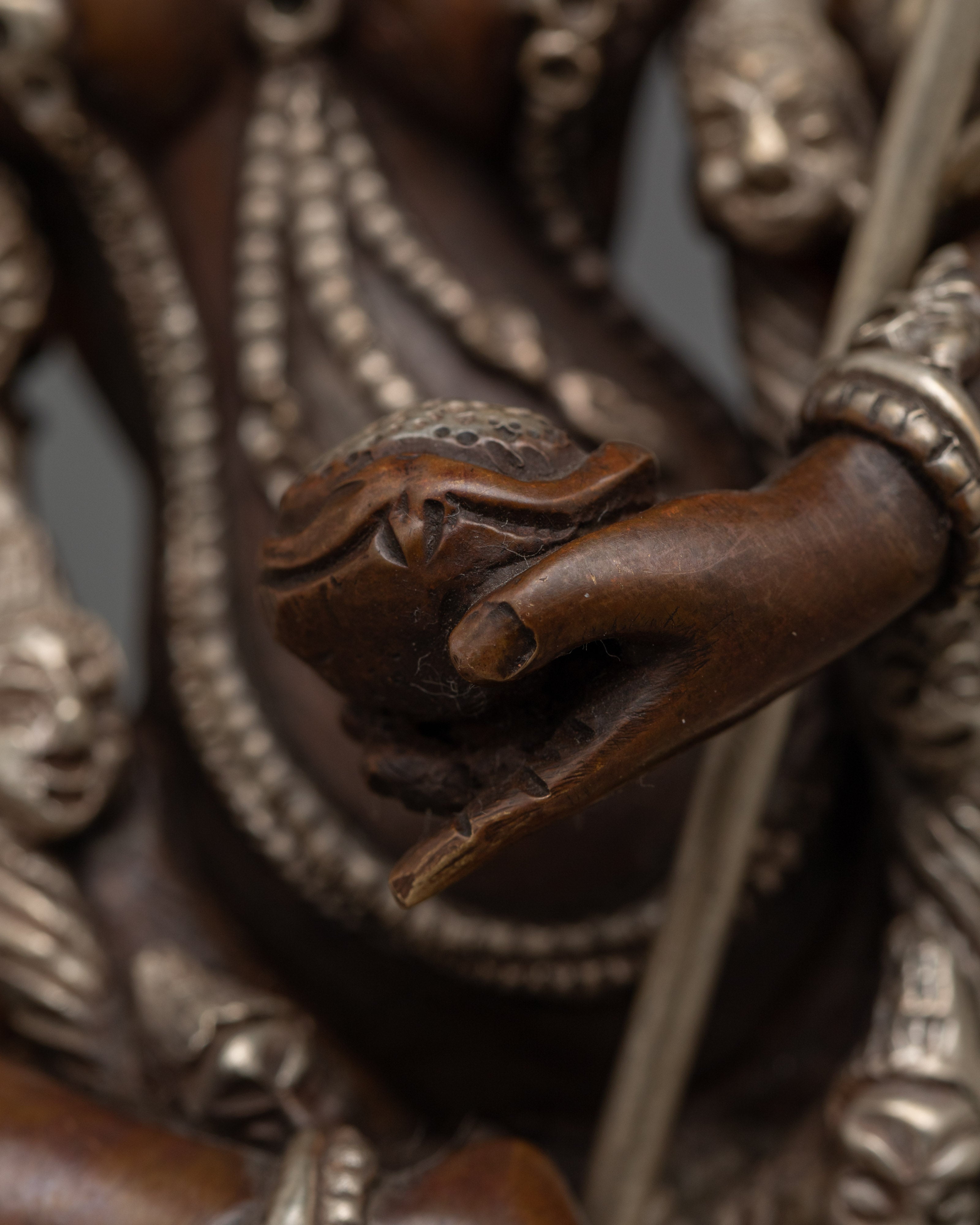 Singhamukha Buddha Statue | Silver-Plated Oxidized Copper Sculpture