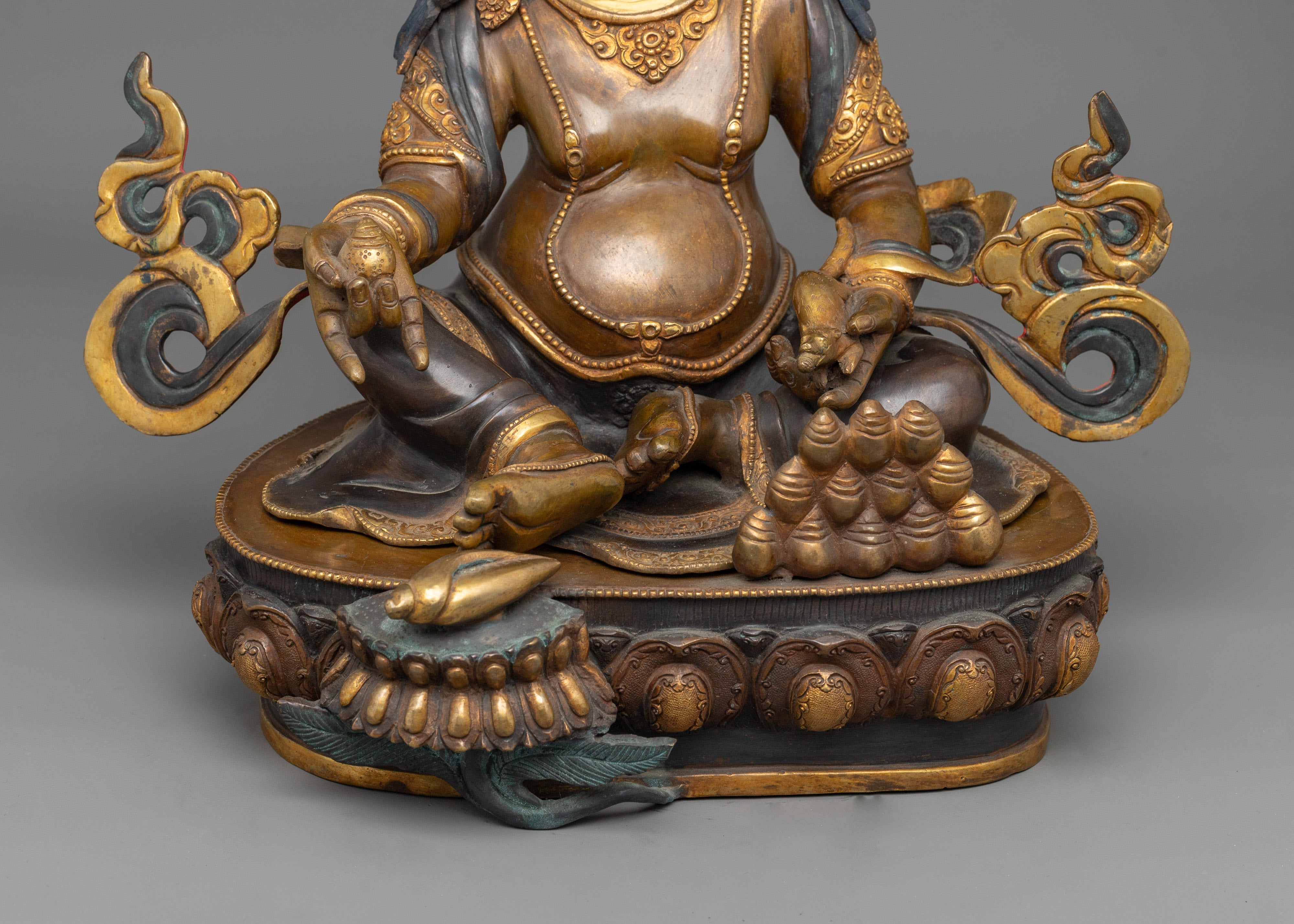 Handcrafted Dzambhala Guru Holding Mongoose | Statue of Wealth and Prosperity