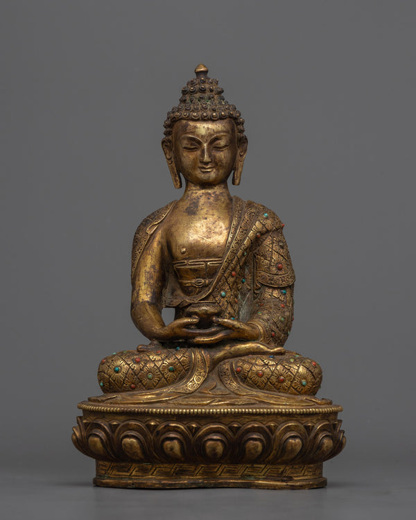 antique garden statue of Amitabha Buddha