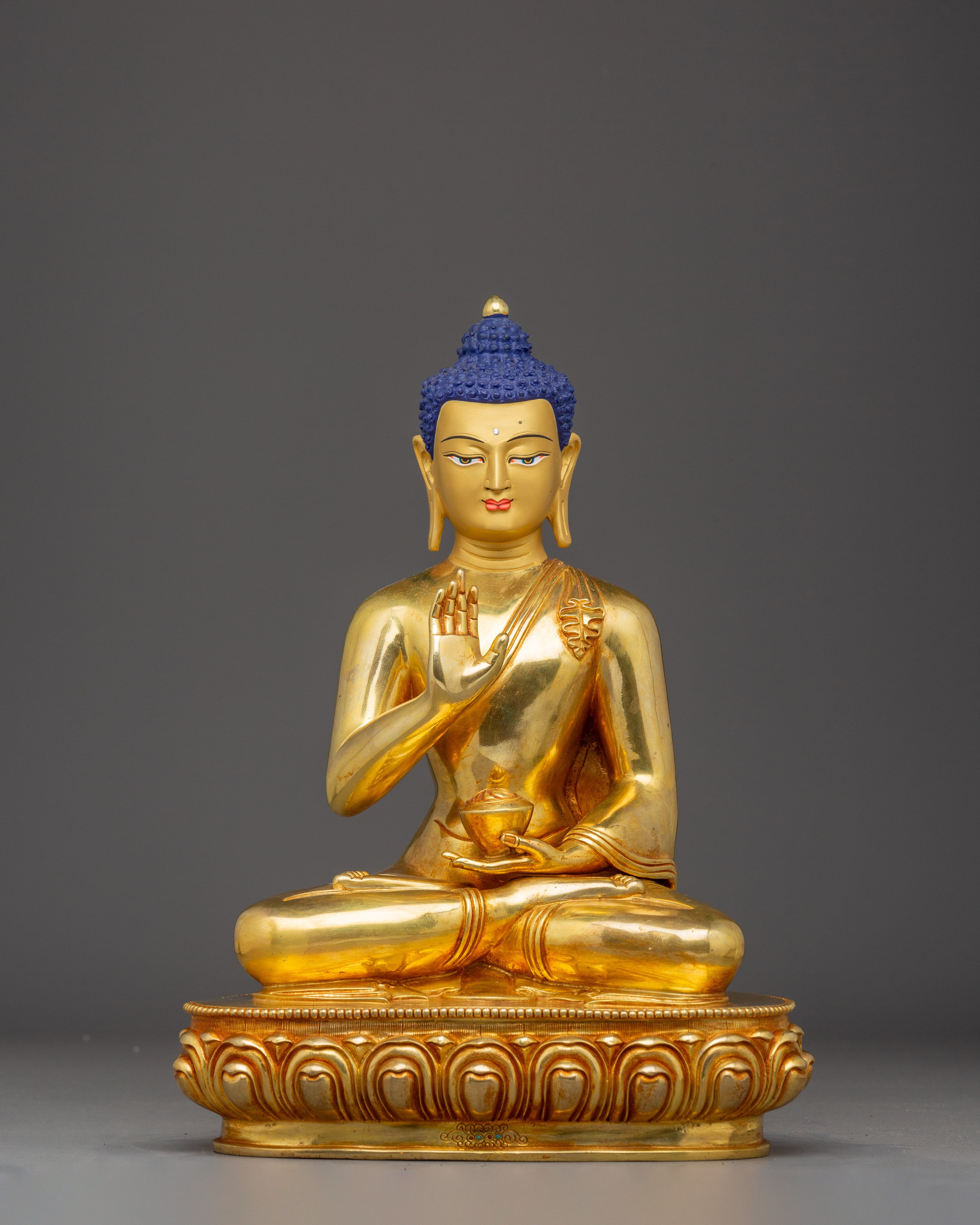 Amoghasiddhi Buddha statue in 24K gold