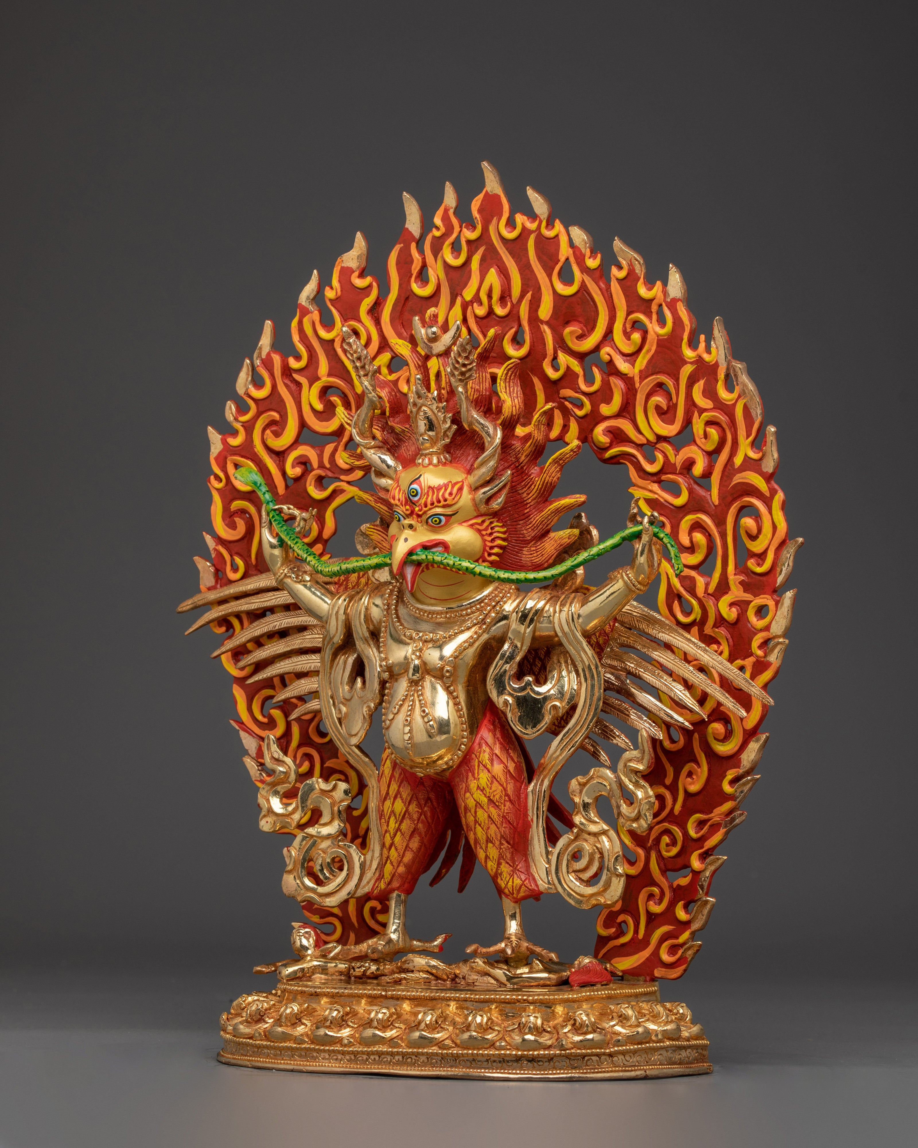 Garuda statue with flaming aureole | Spiritual Buddhist Art for Protection and Power