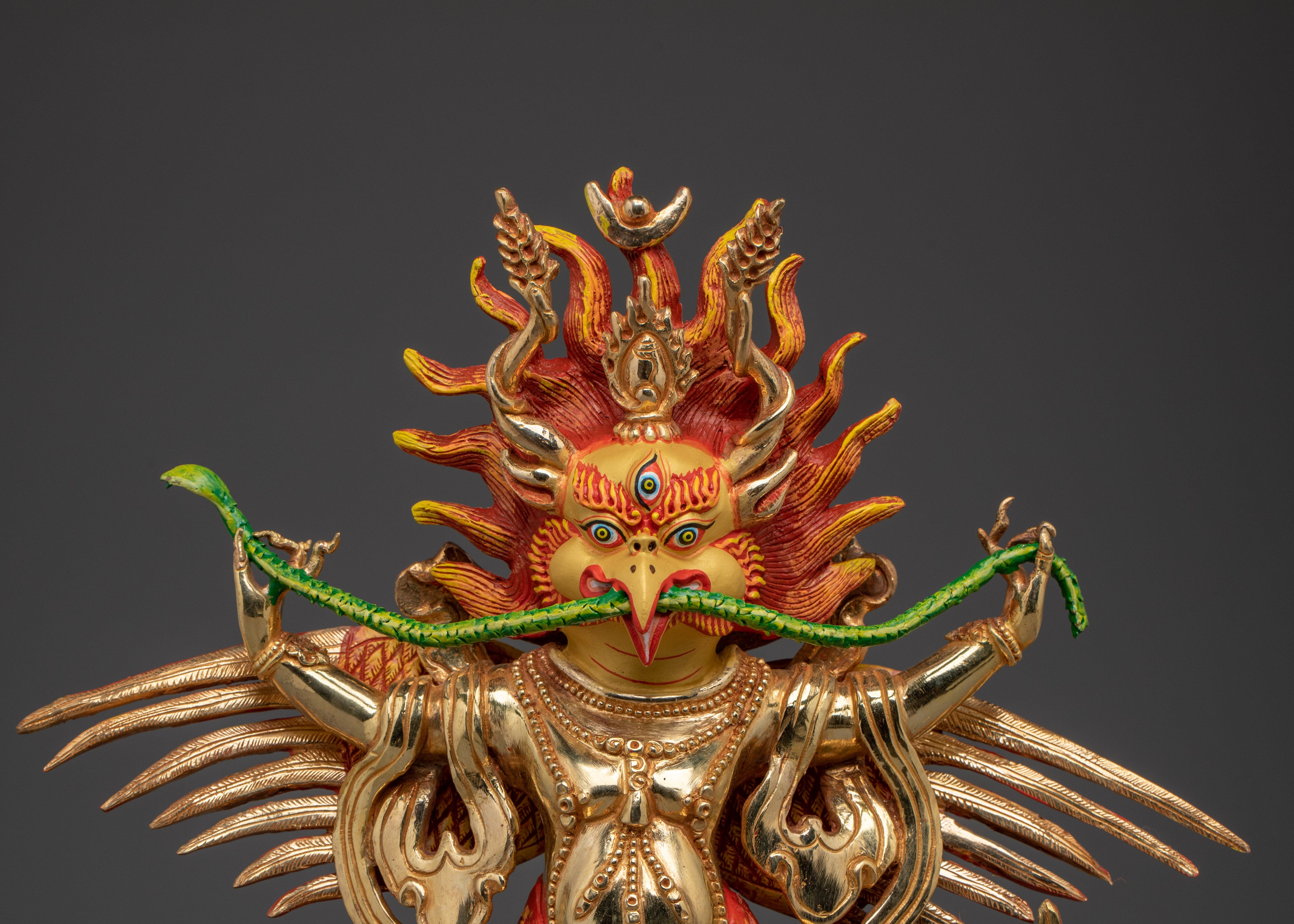 Garuda statue with flaming aureole | Spiritual Buddhist Art for Protection and Power
