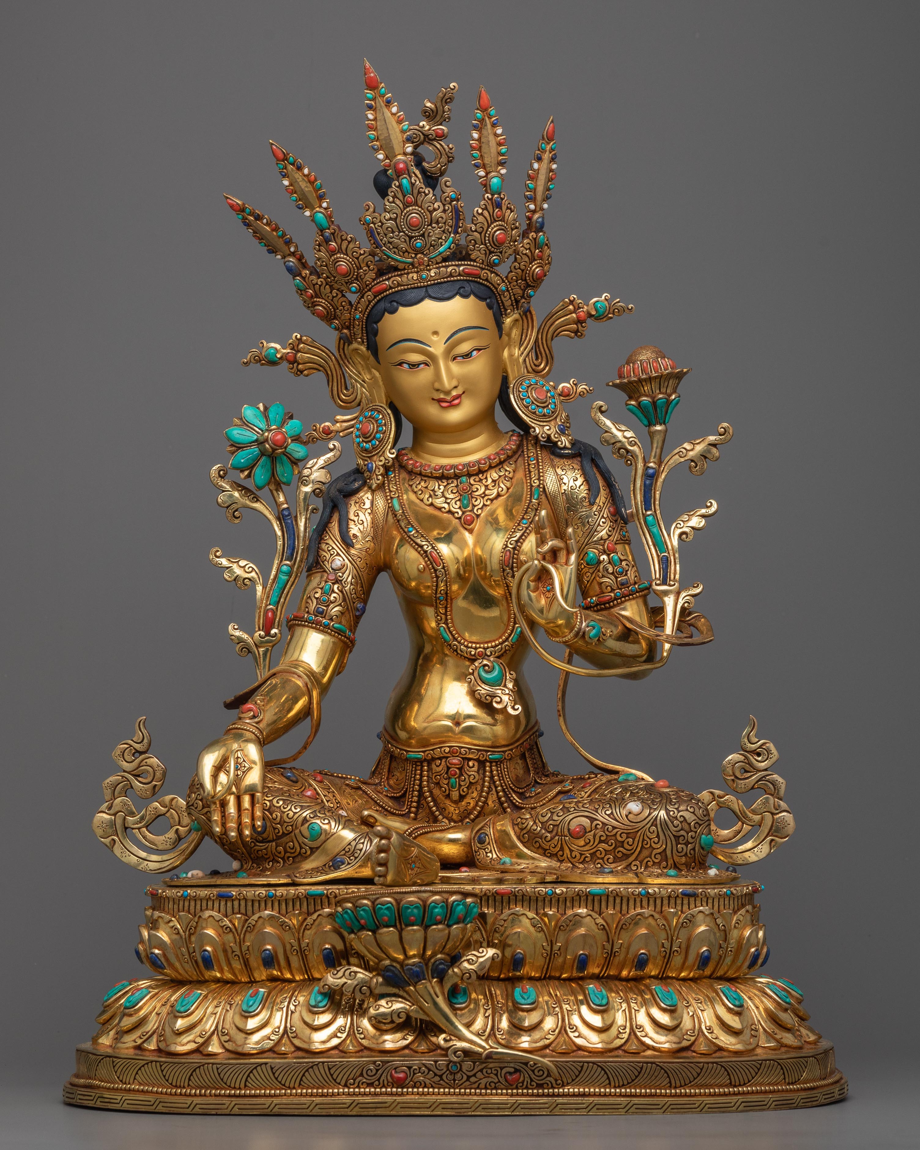 green tara statue lotus