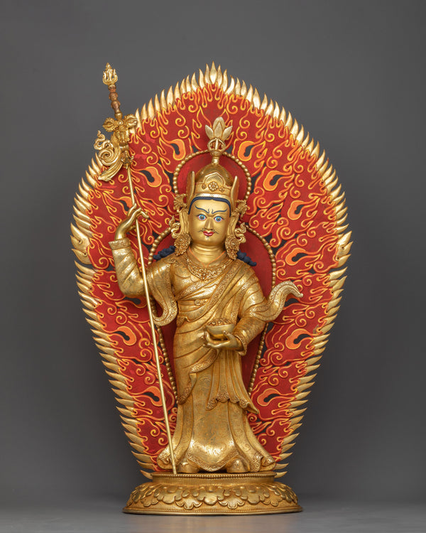 standing guru-rinpoche with red aura flowing