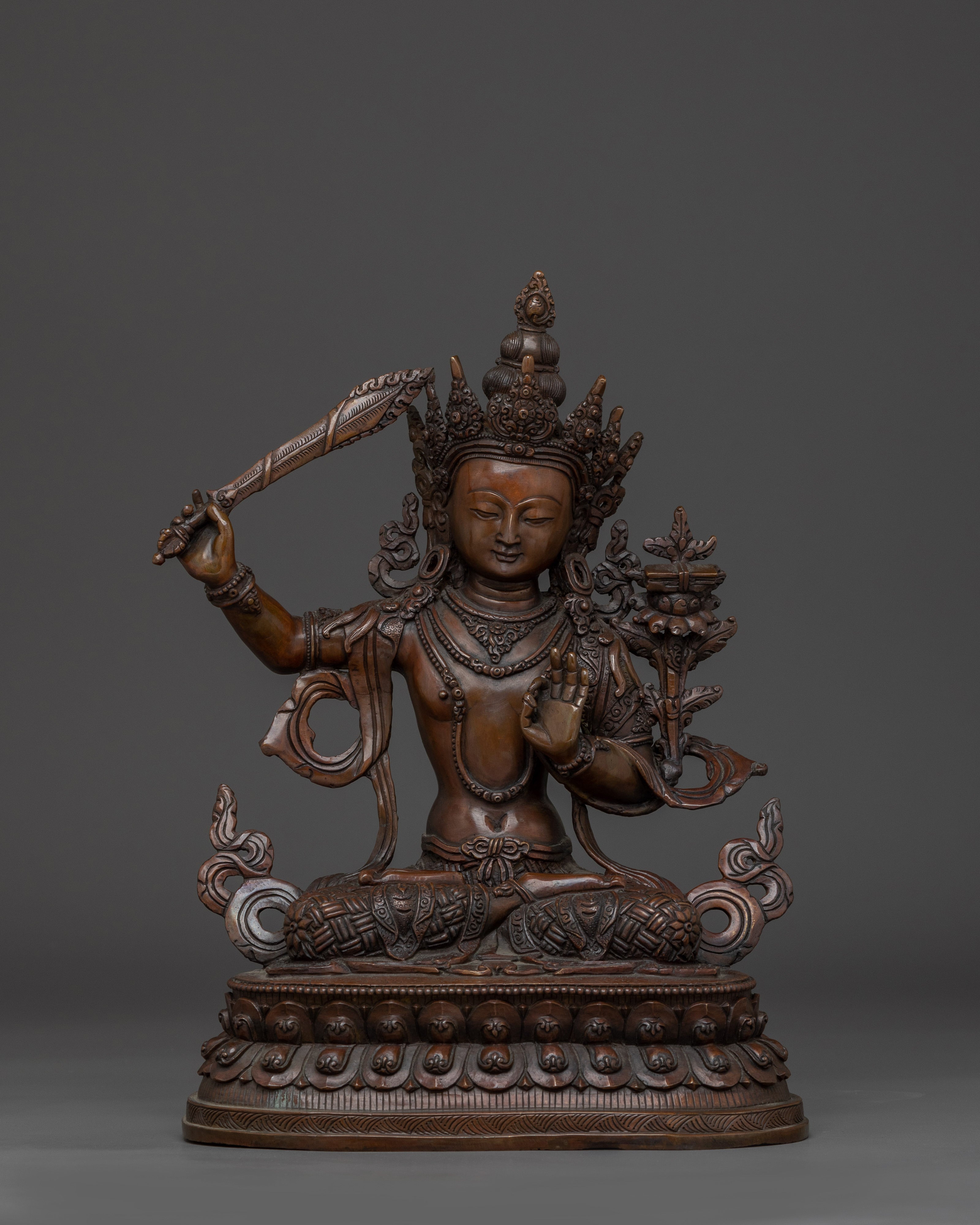 Oxidized copper Manjushri statue