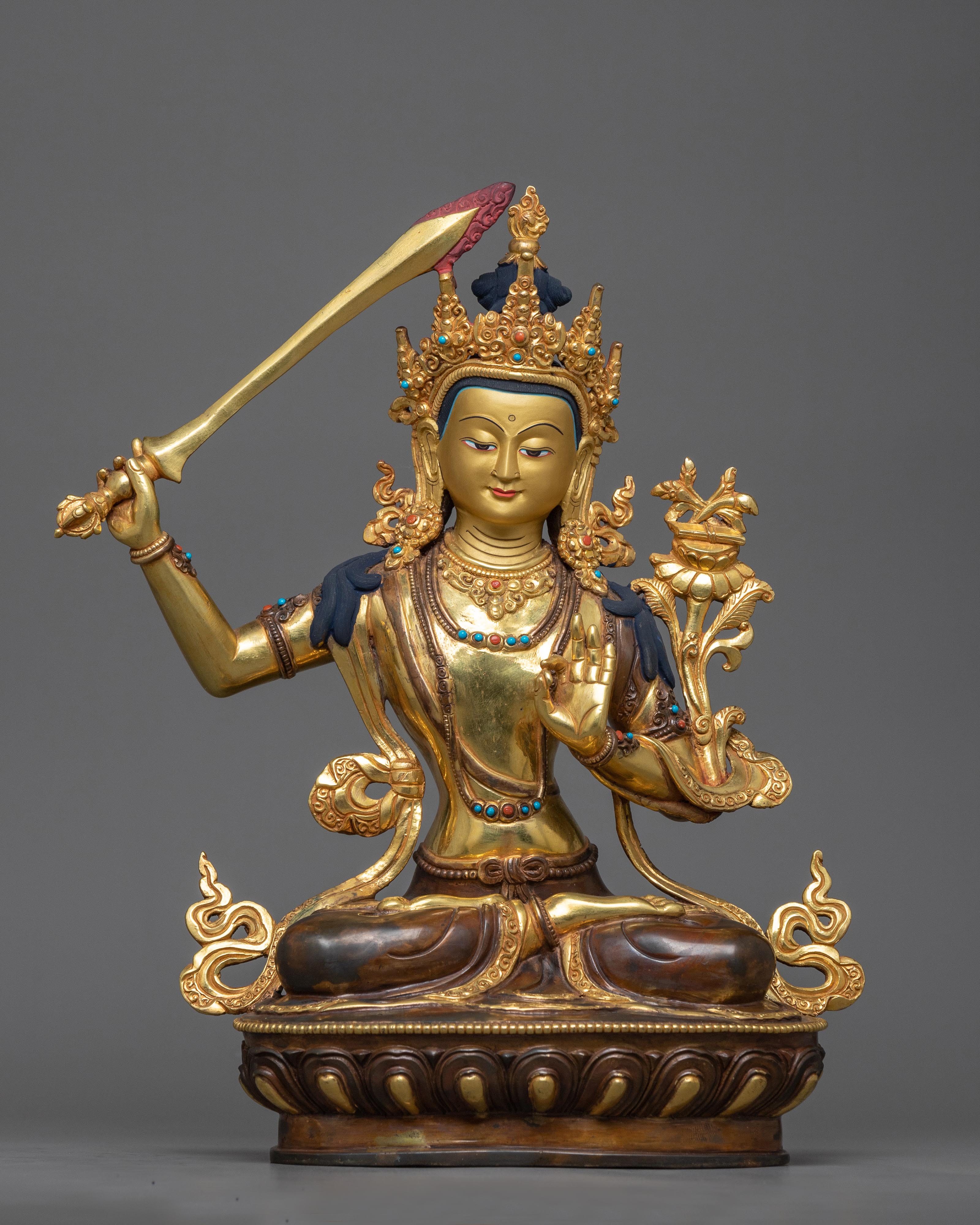 Manju Shri Statue in 24K Gold | A Representation of Wisdom and Insight Manju Shri Statue in 24K Gold | A Representation of Wisdom and Insight