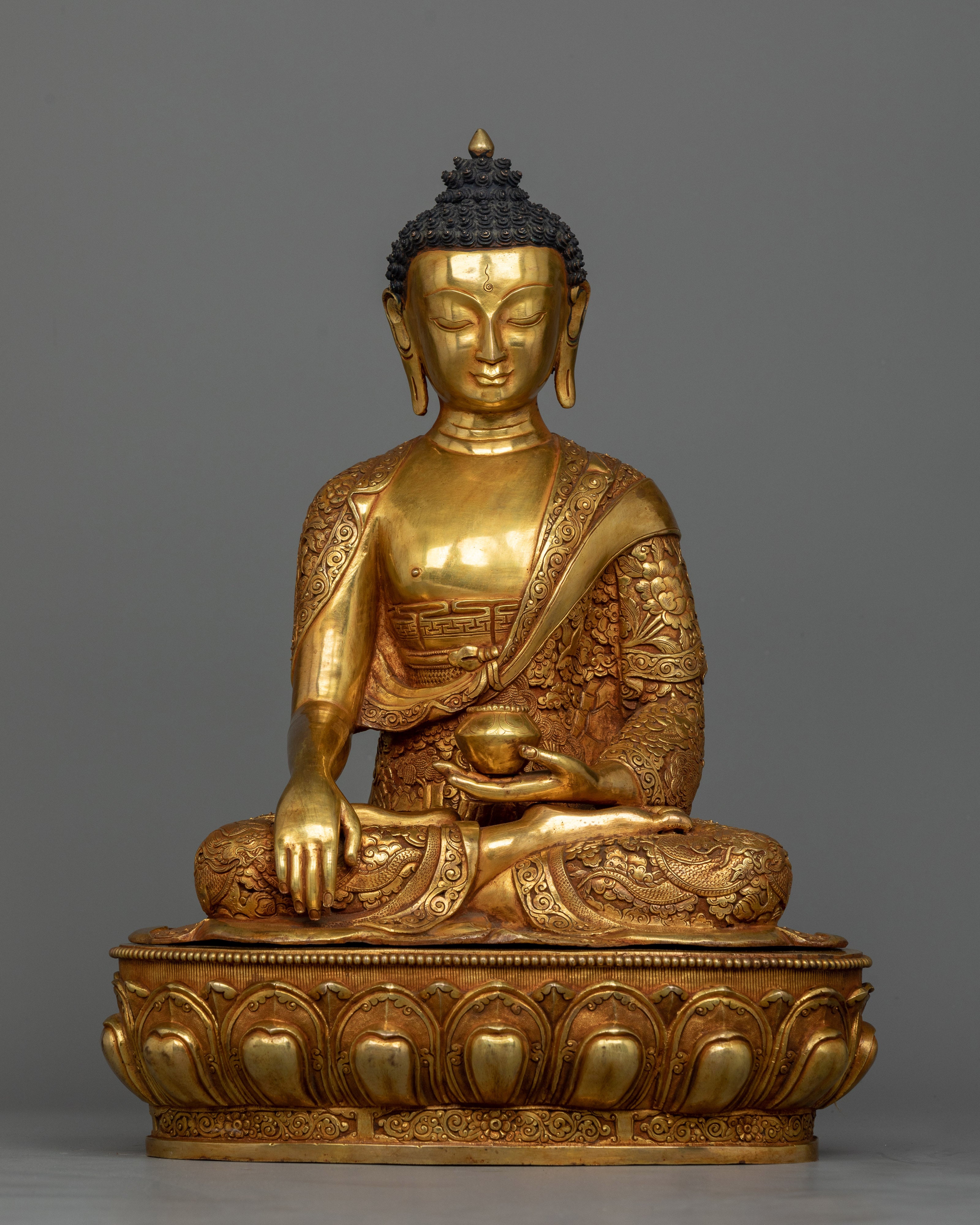 Gilt buddha sculpture
