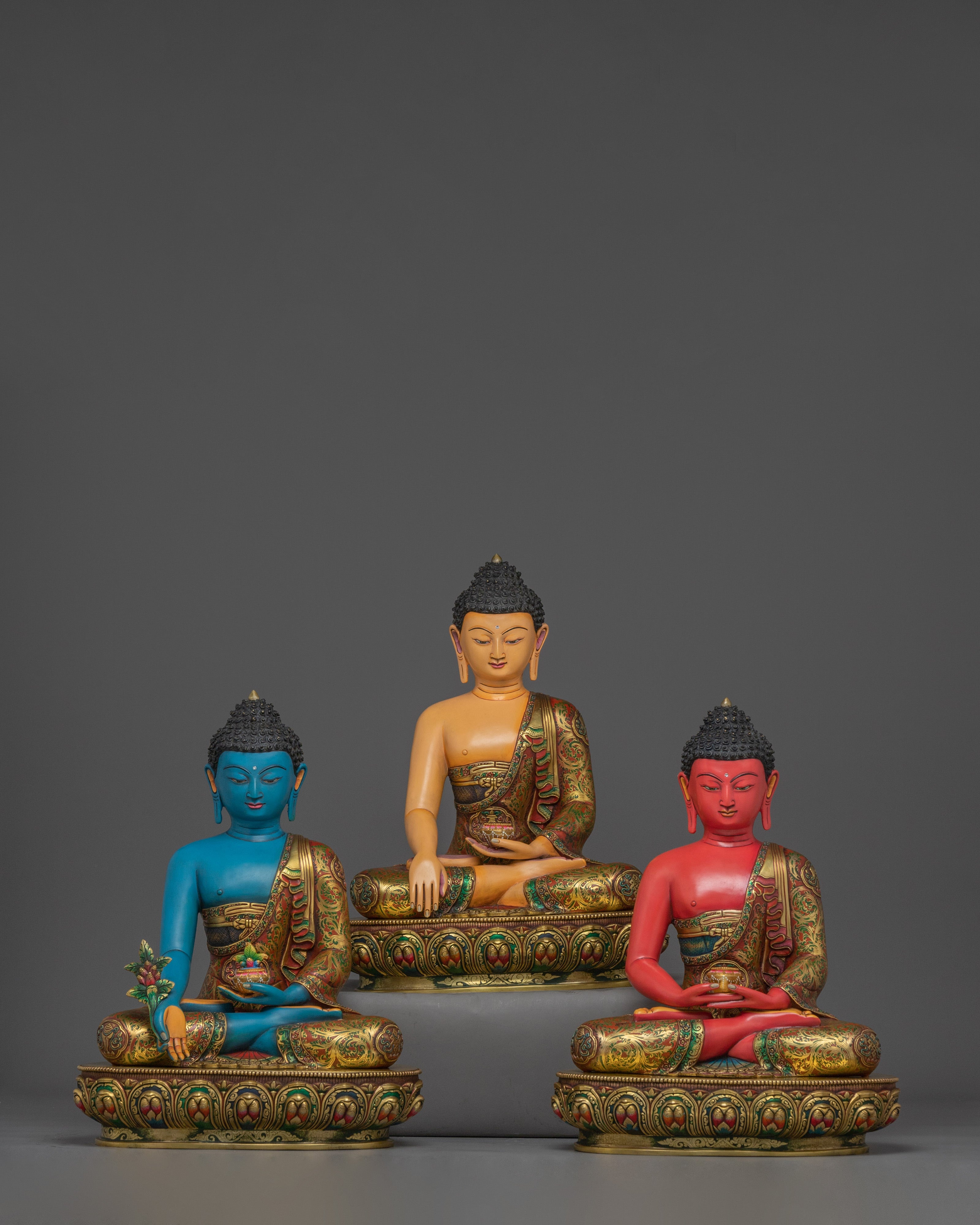 Vibrant Three Buddha Statue Set