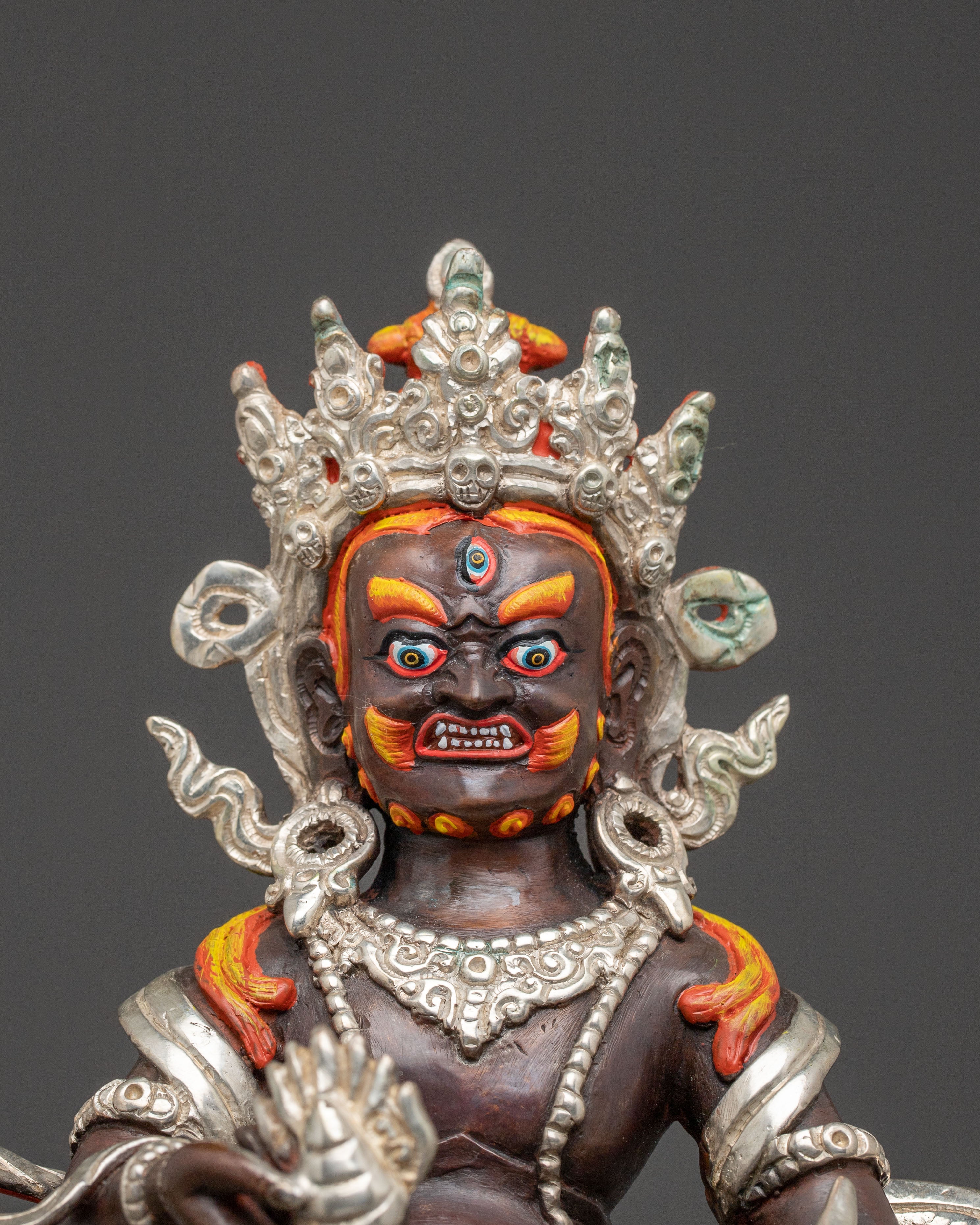 Handcrafted Statue of Red Dzambhala: Oxidized Copper Form