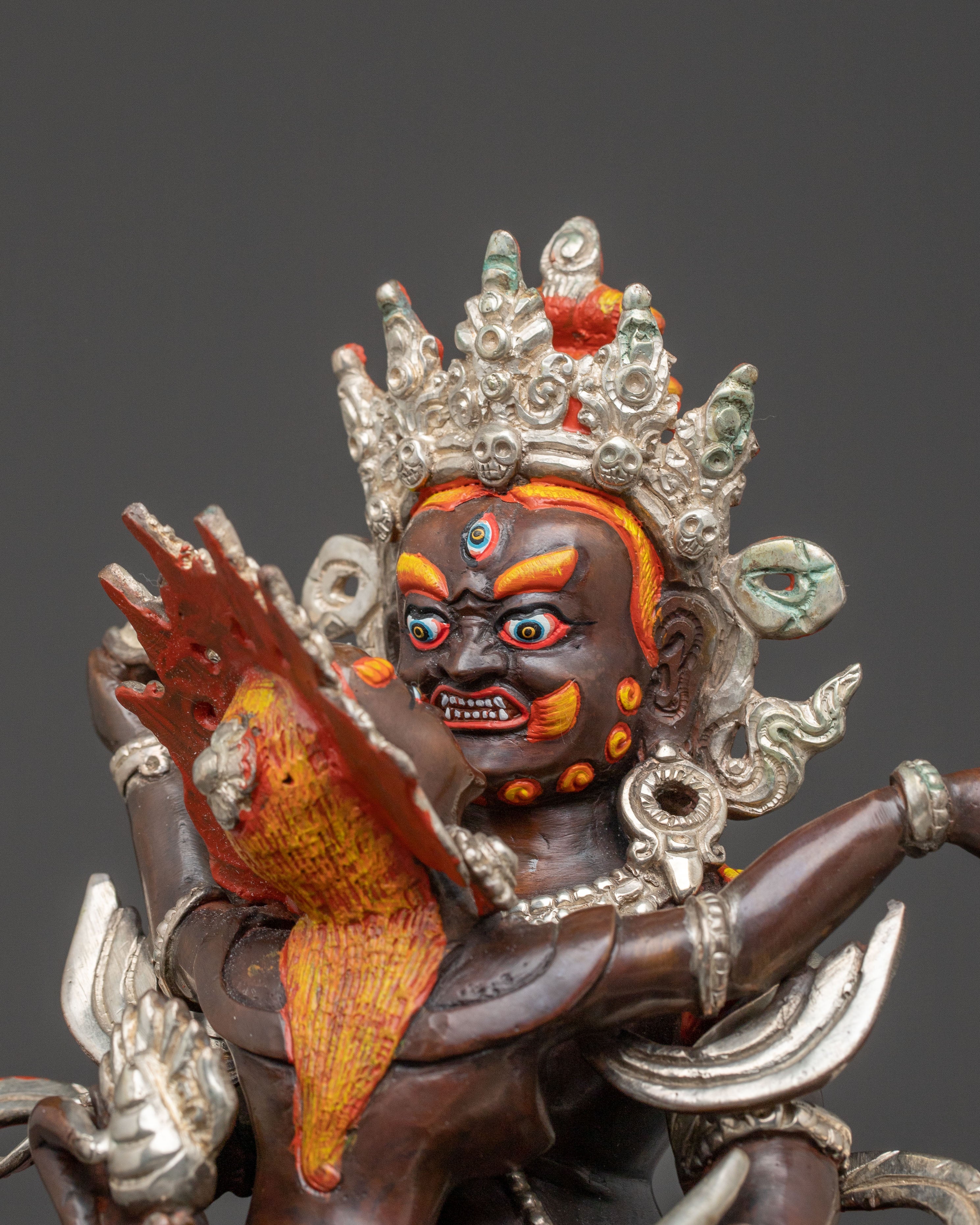 Handcrafted Statue of Red Dzambhala: Oxidized Copper Form