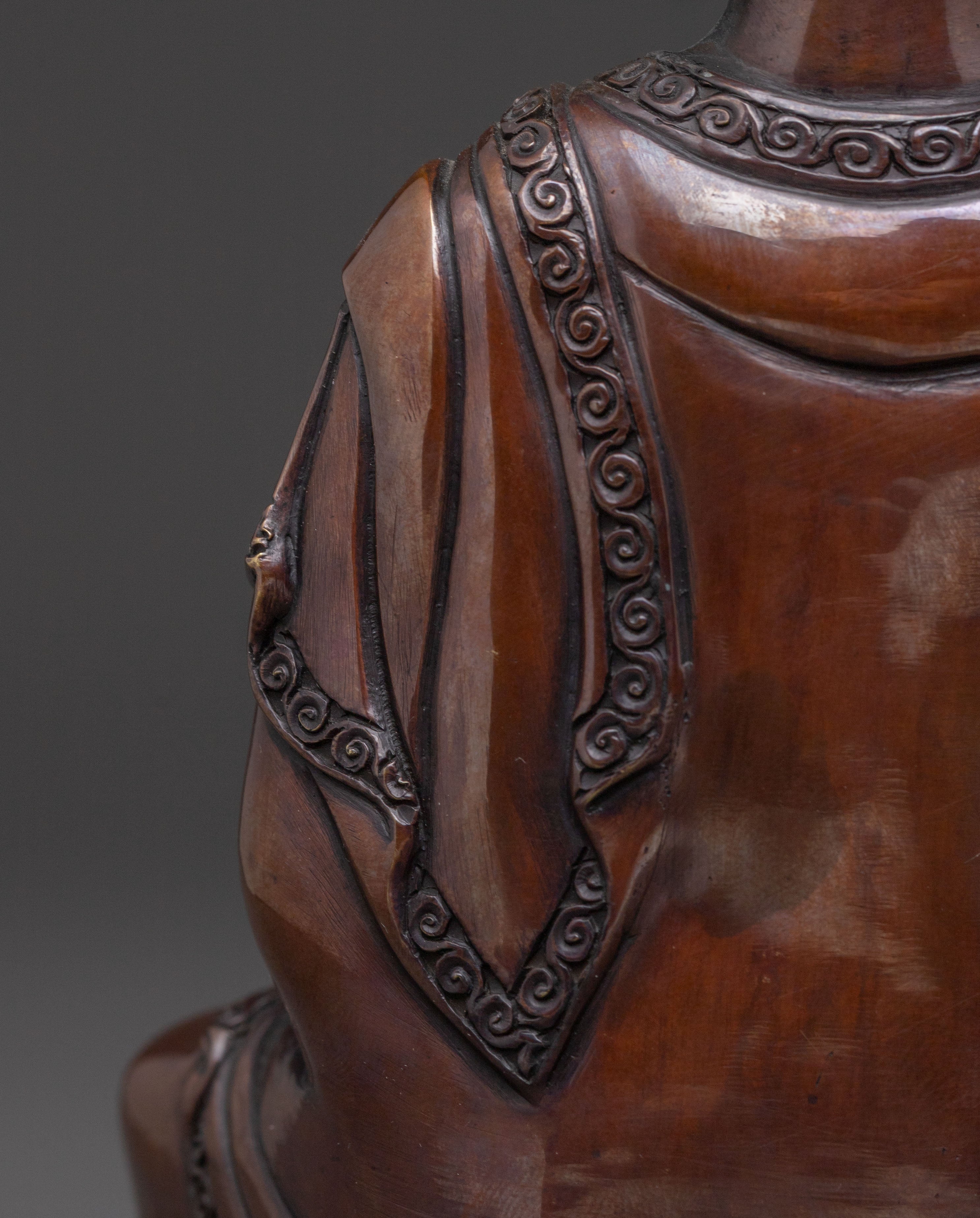 A Serene Oxidized Copper Statue of the Historical Shakyamuni Buddha
