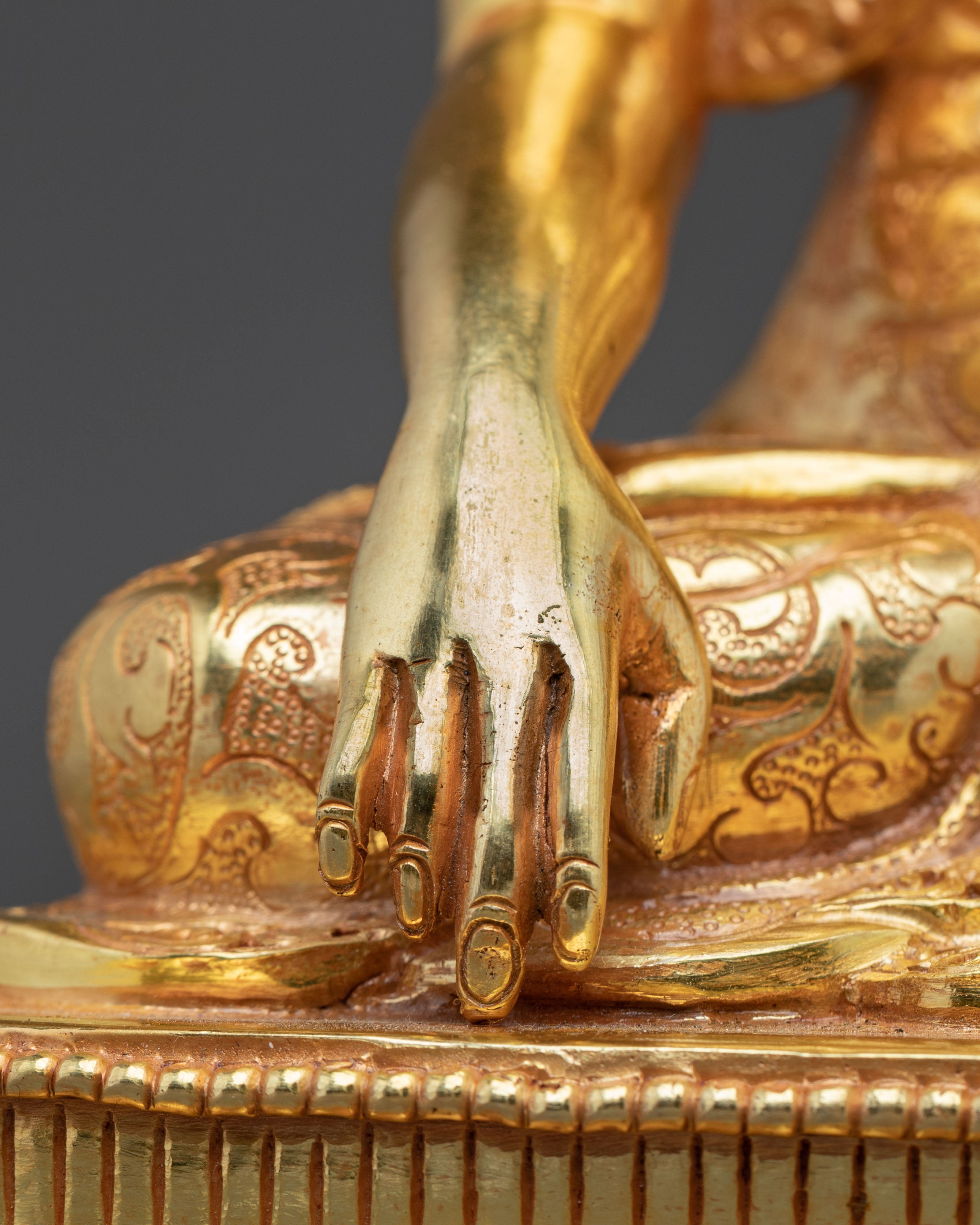 Mitrugpa Golden Figurine: Serene Radiance