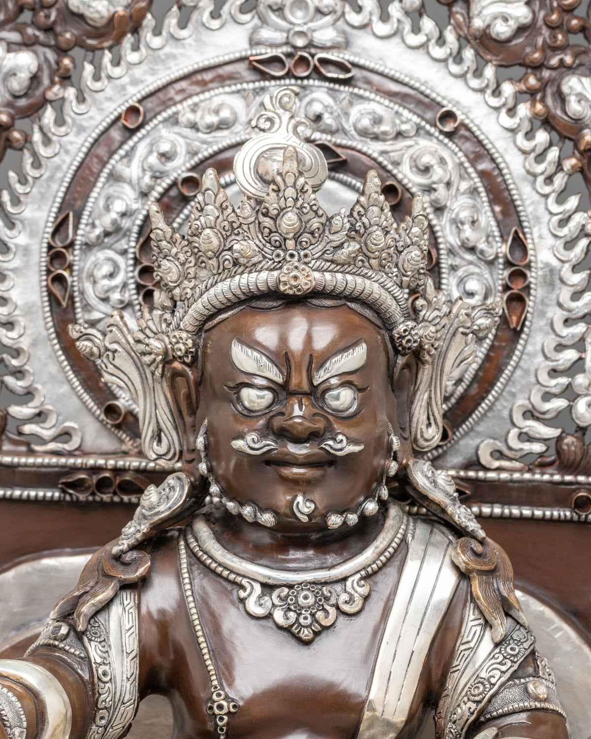 Dzambhala Statue on Throne | Oxidized Copper Figurine with Silver Plating