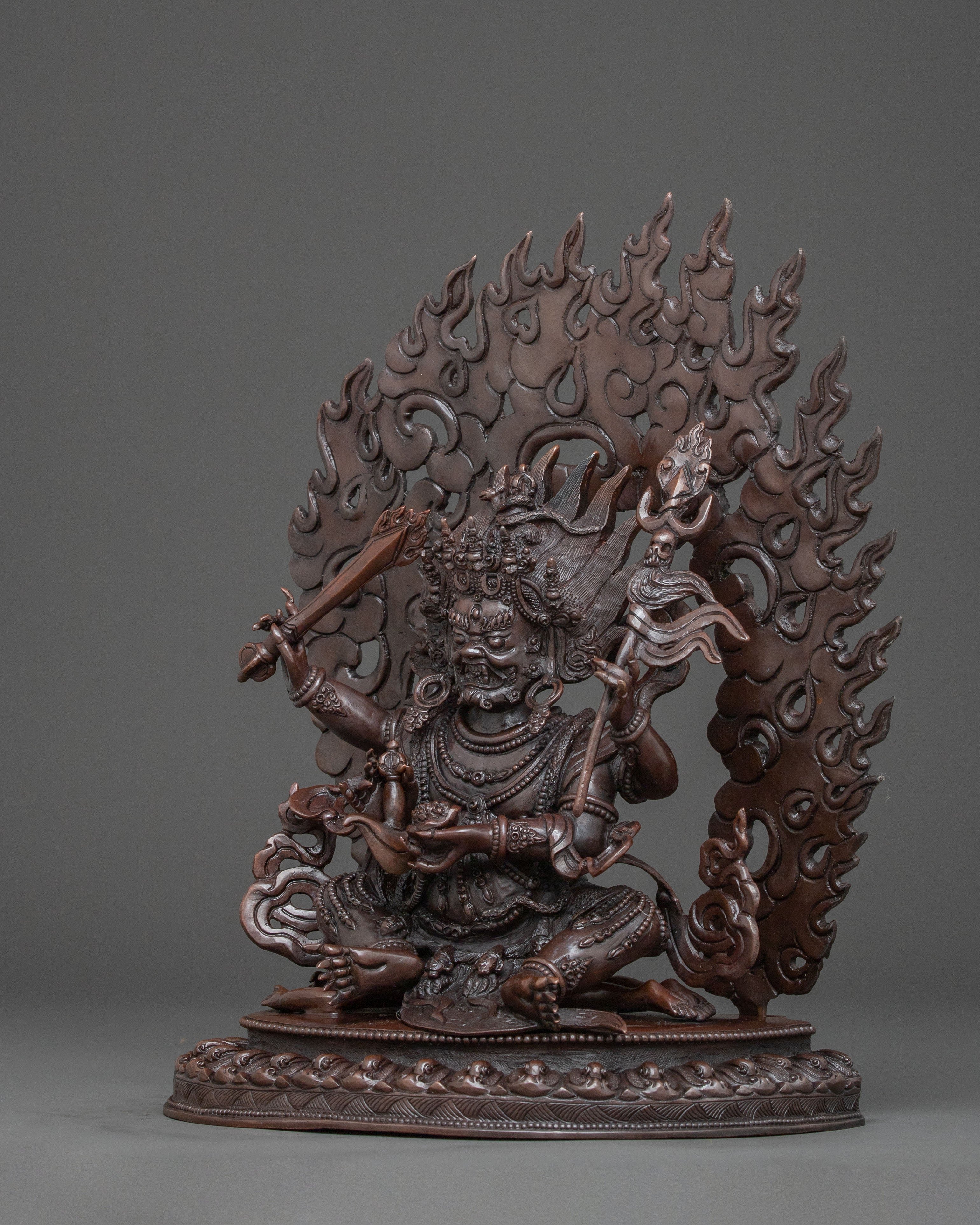 Four Armed Mahakala Statue in Oxidized Copper