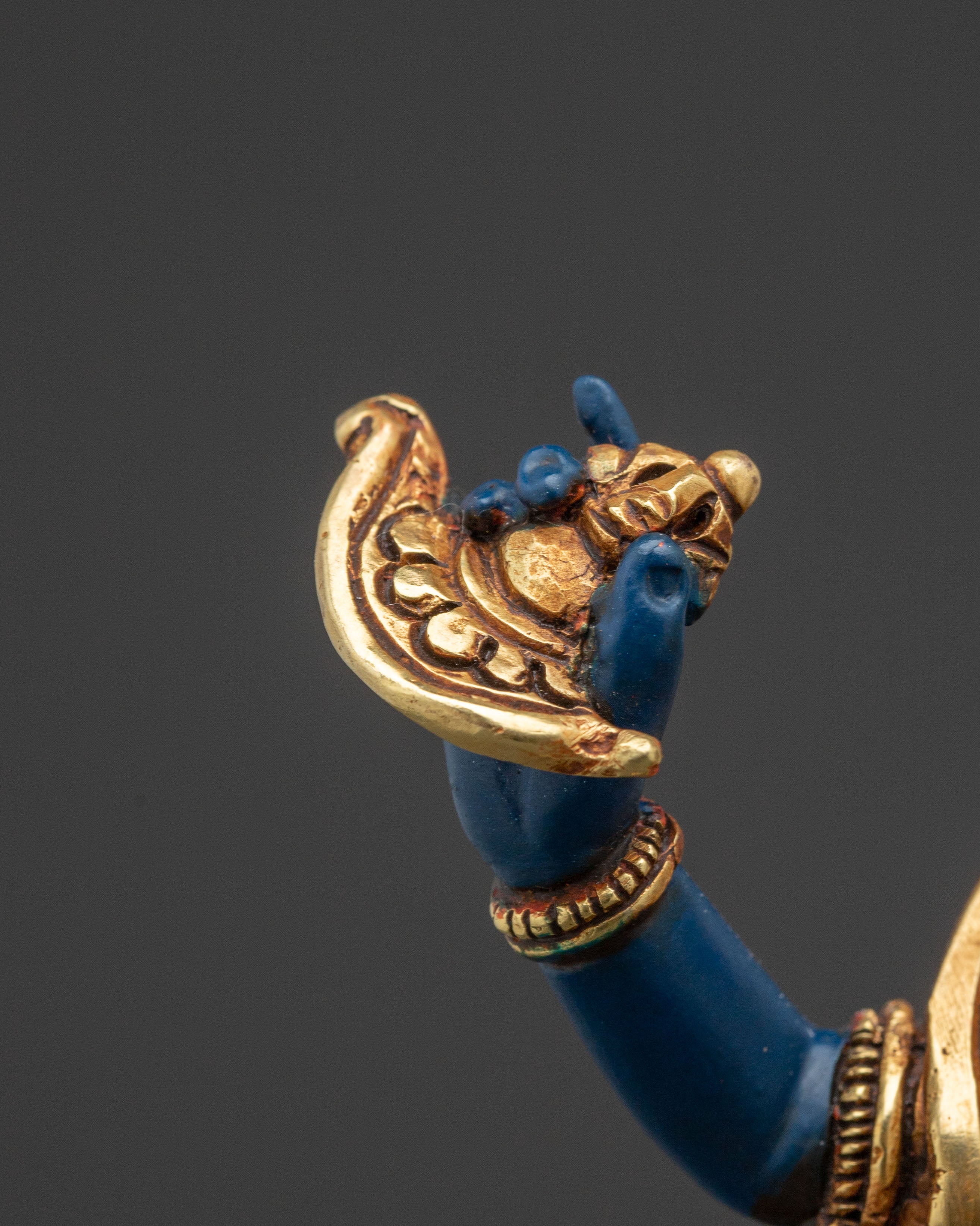 Shima mukha Lion Faced Dakini Statue: Gilded Copper Art